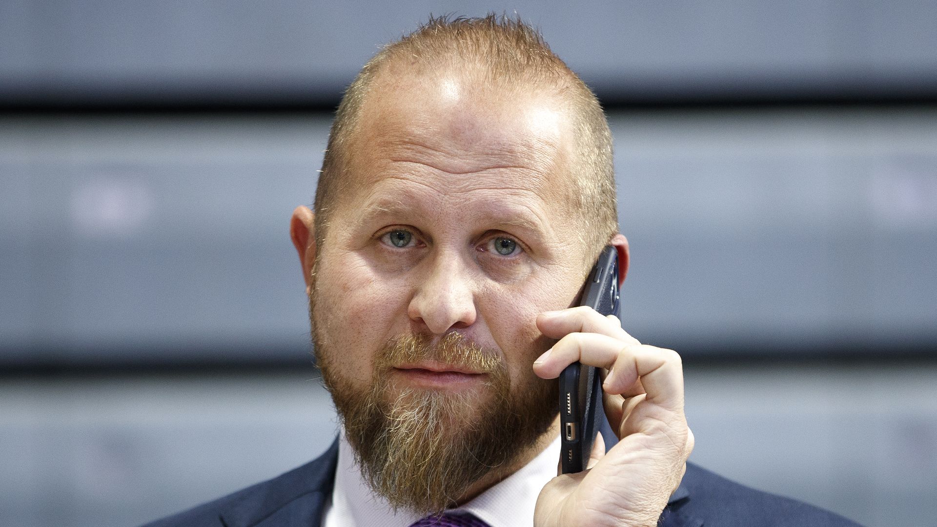  Brad Parscale, campaign manager for President Donald Trump's re-election campaign, speaks on the phone ahead a campaign rally inside of the Knapp Center arena at Drake University on January 30