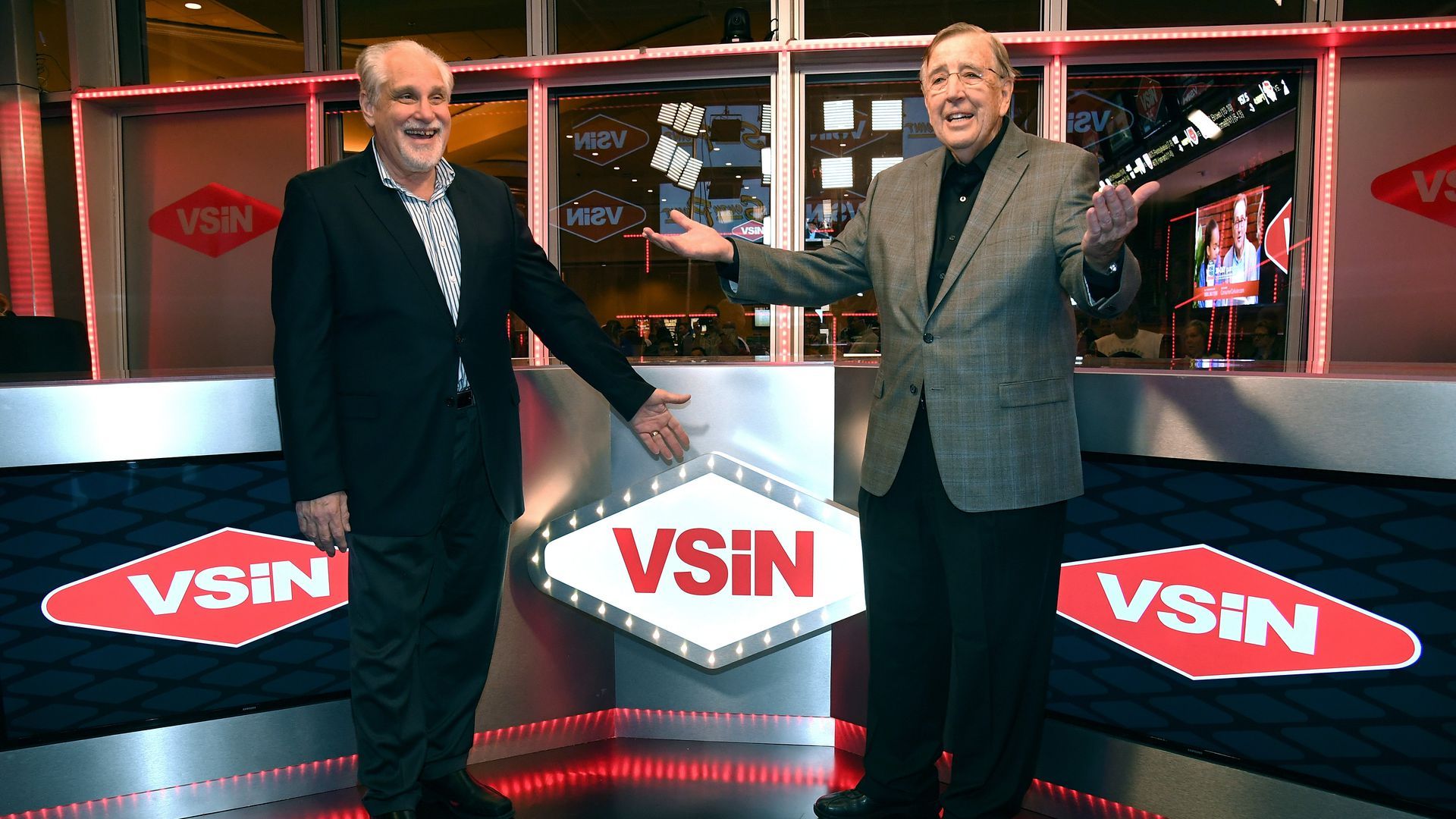 Al Bernstein (left) and Brent Musburger unveil VSiN's first studio in 2017. 