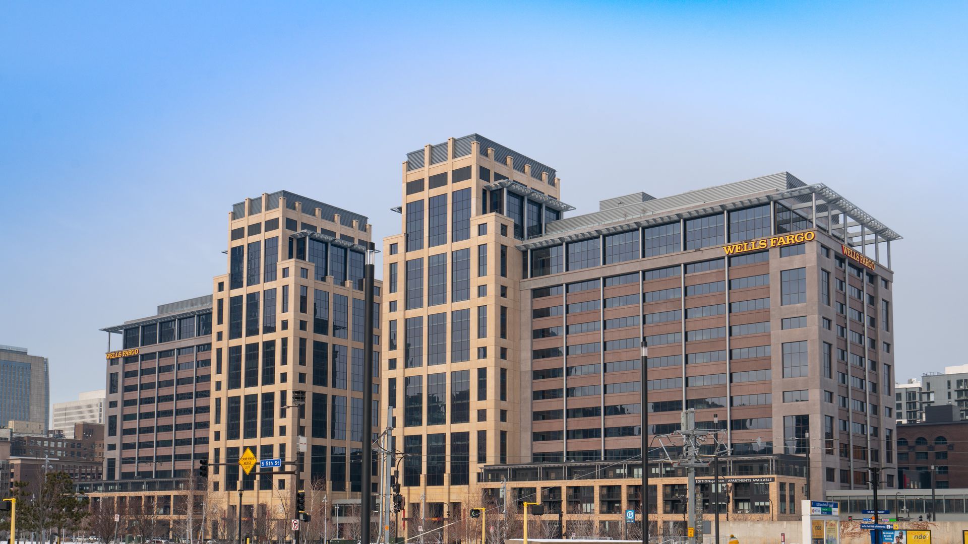 A photo of the exterior of a Wells Fargo office building.
