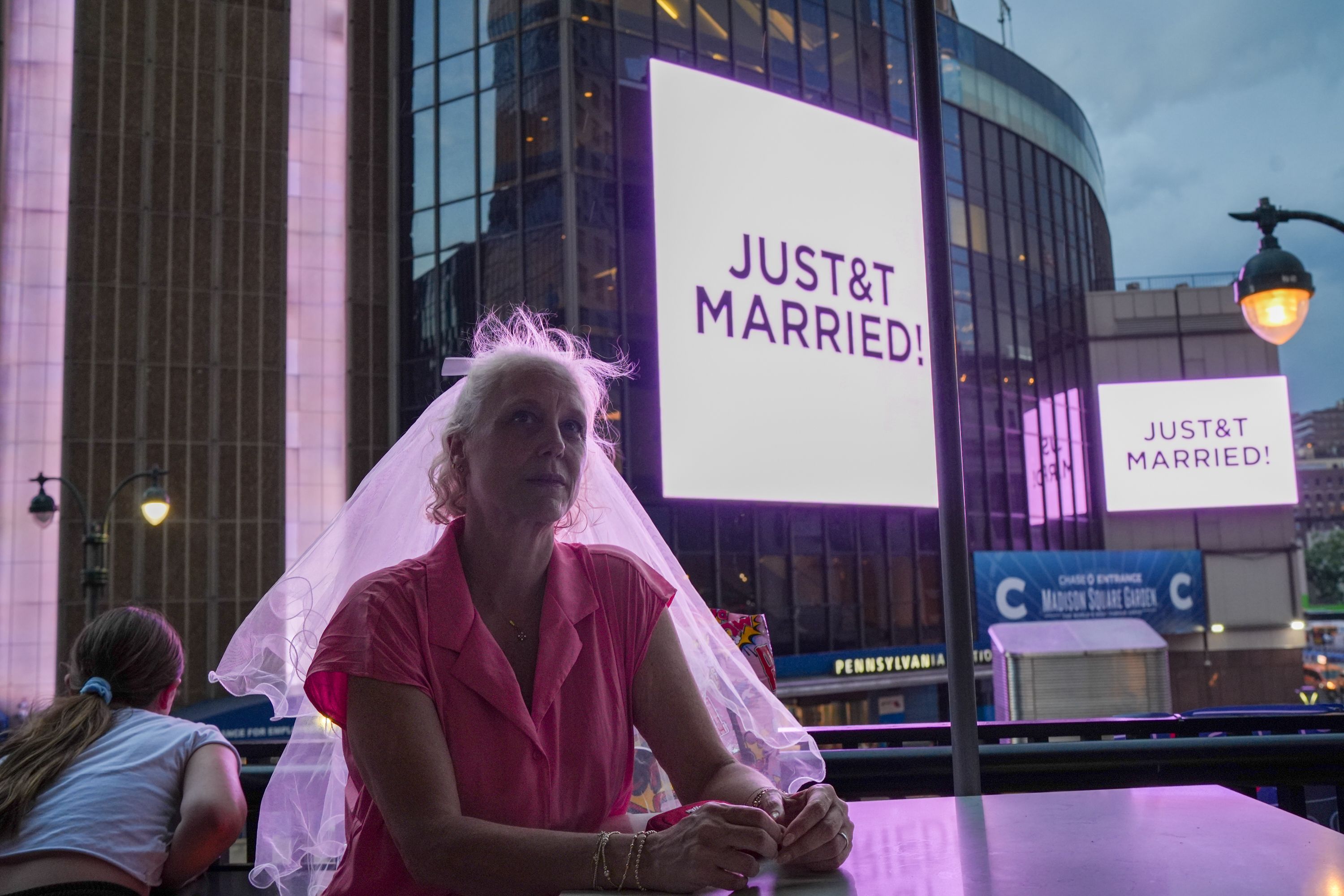 A woman in a veil outside Madison Square Garden