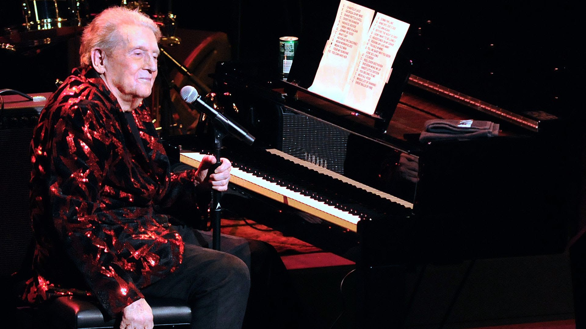 Jerry Lee Lewis sits in front of a piano at the Van Wezel Performing Arts Hall in Sarasota.
