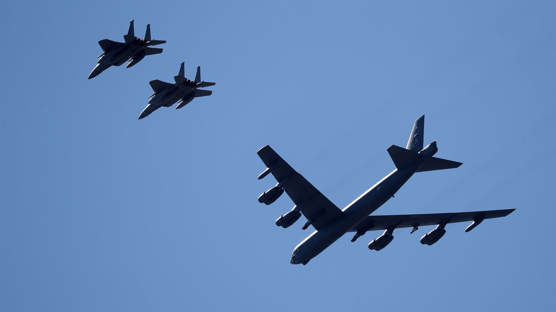 A B-52 Bombers and two F-15 fighter jets flying over in New Orleans in May 2020.