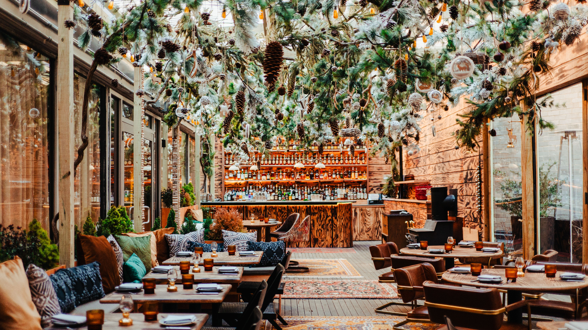 A chalet dining room with faux pines, wood and low tables