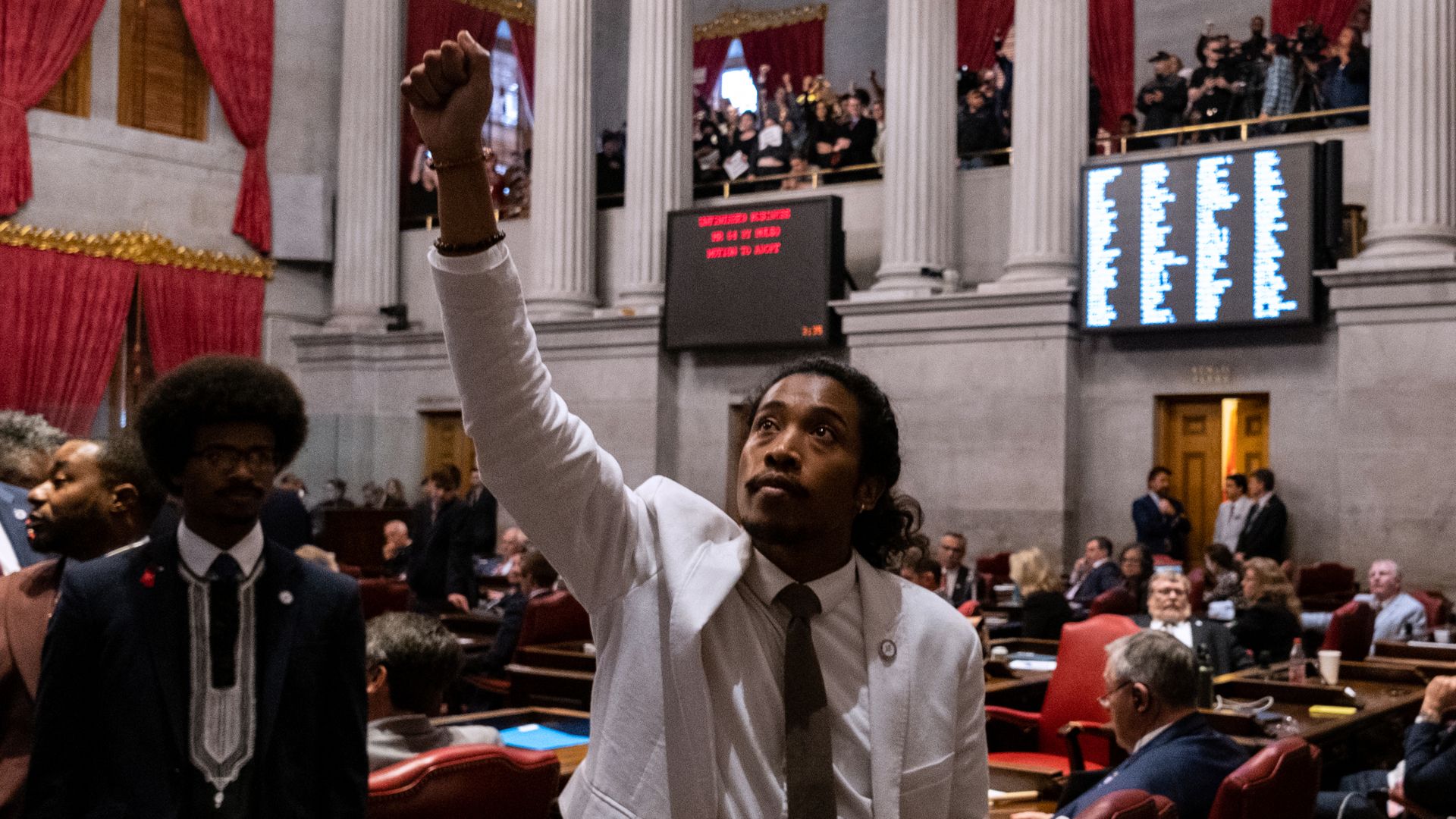 Democratic state Rep. Justin Jones of Nashville gestures during a vote on his expulsion.