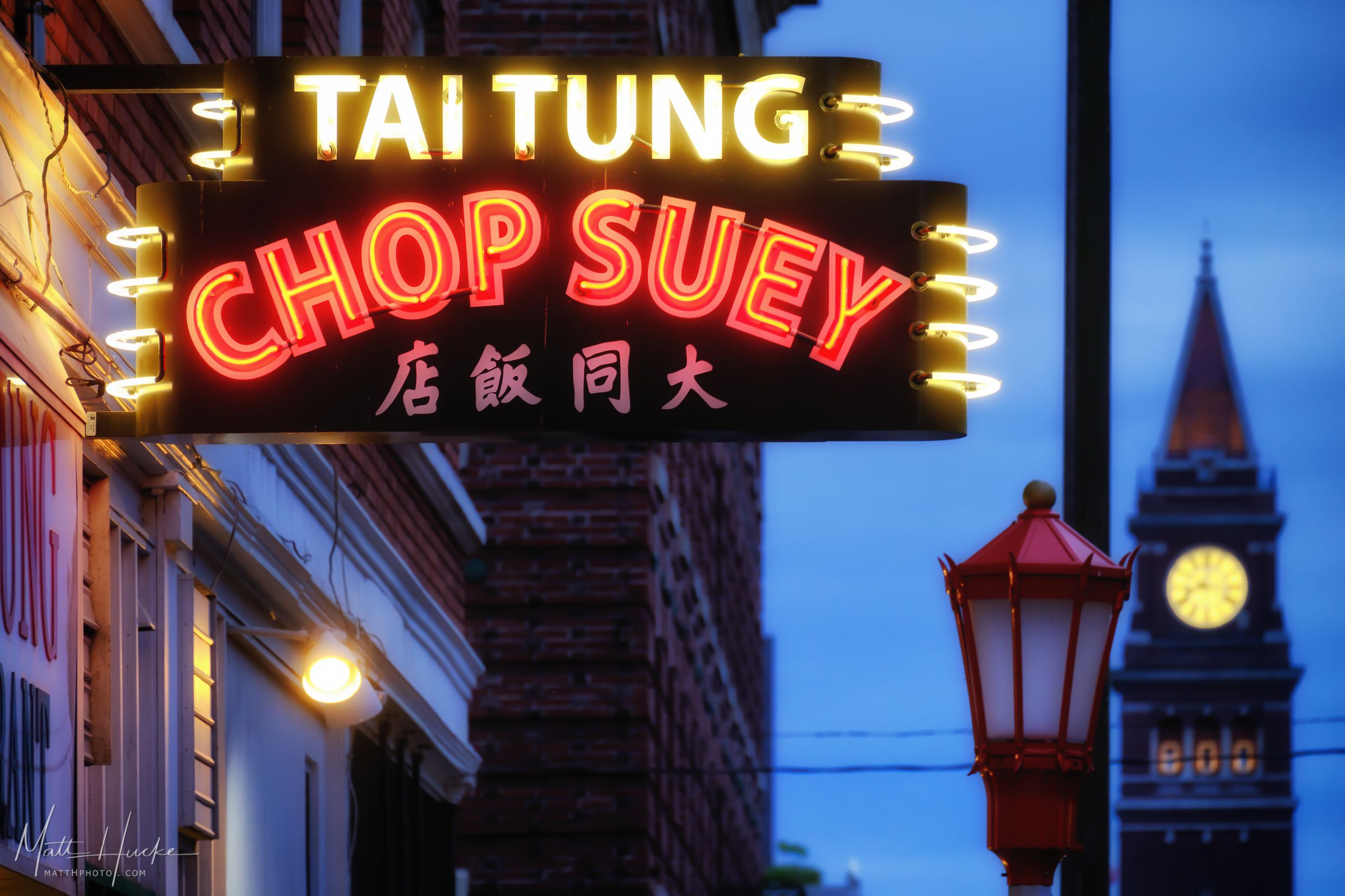 A neon sign in Seattle's International District says "Taitung Chop Suey". 