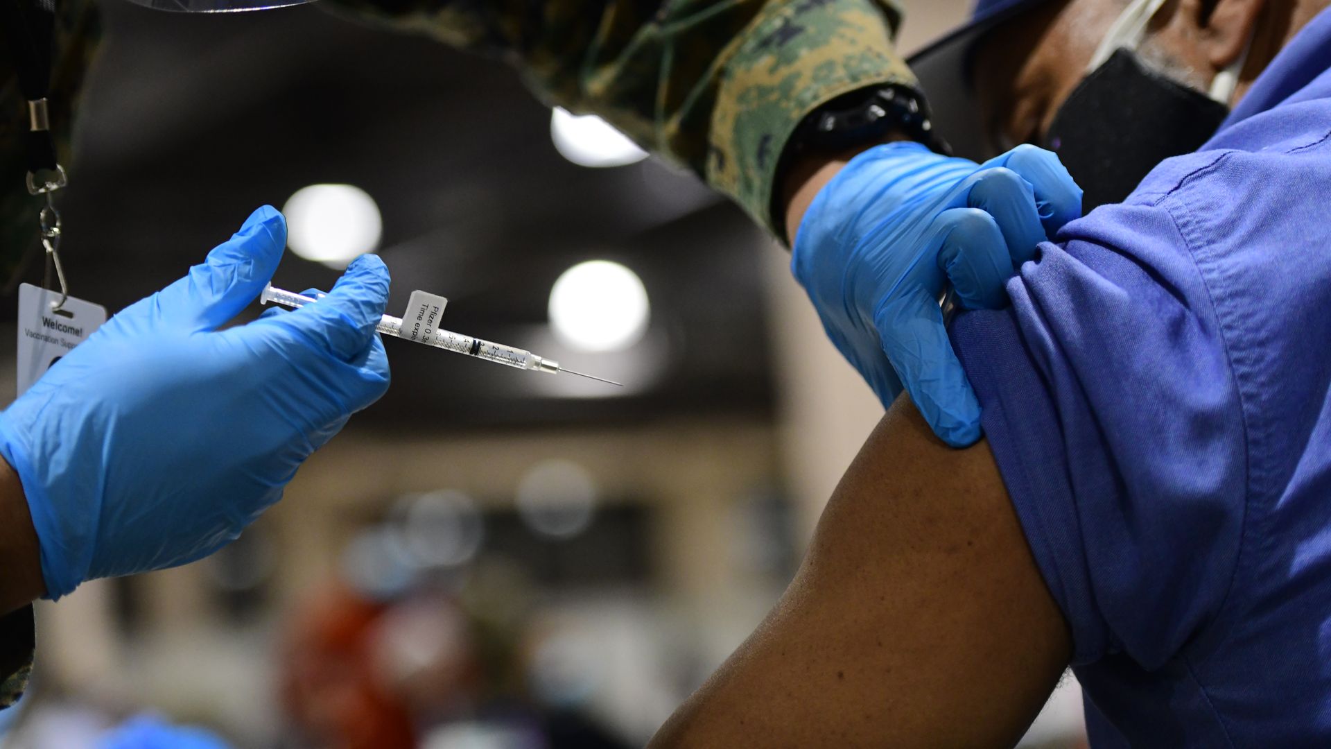 Photo of a person getting a vaccine shot in their arm