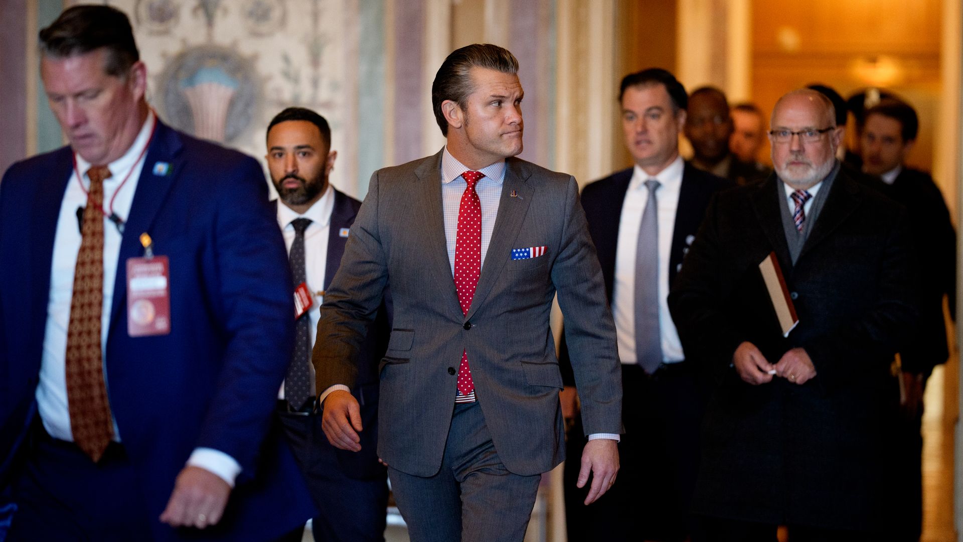 Man walking with entorage