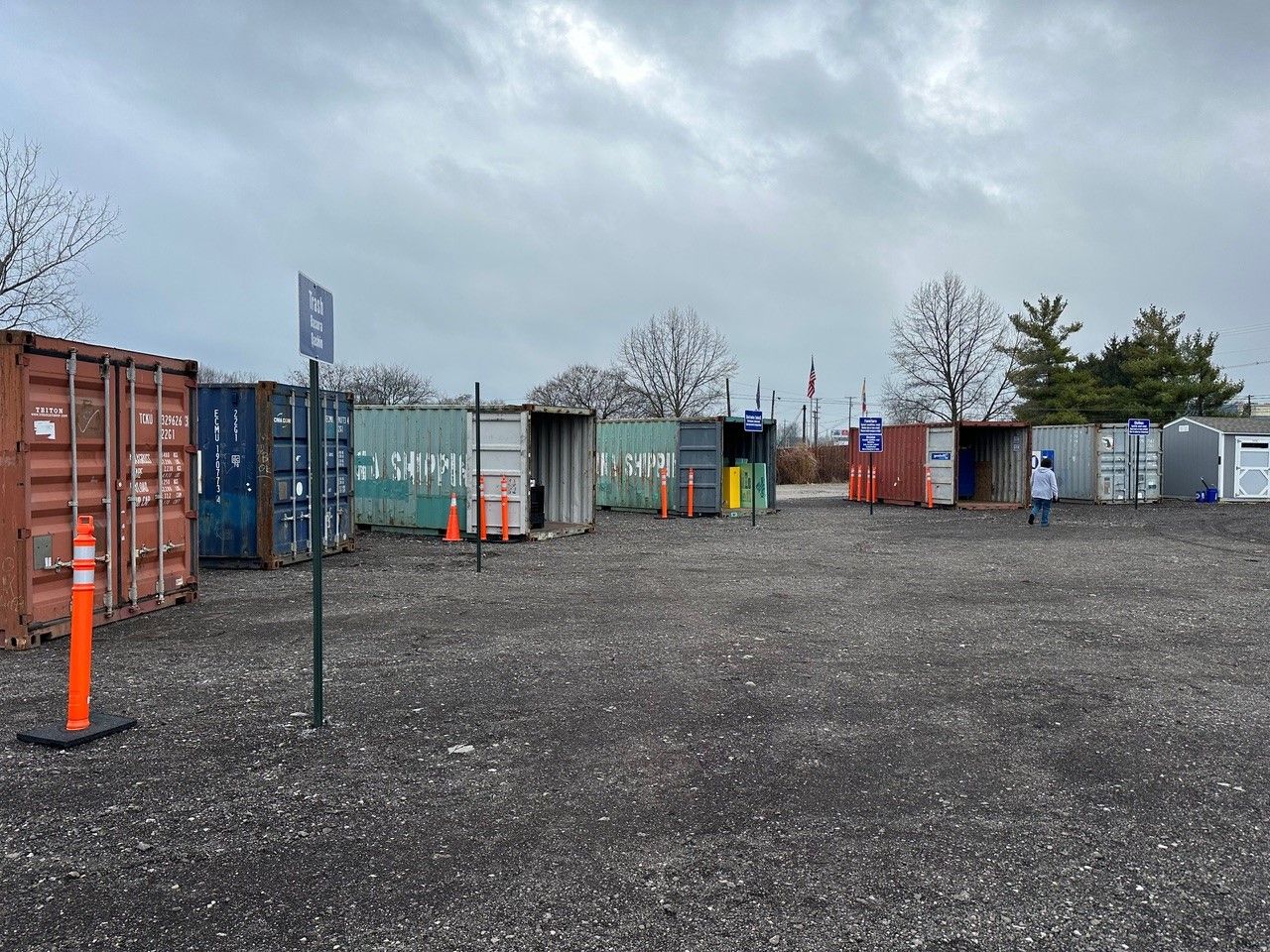An overview of a recycling convenience center in Columbus, with several open shipping containers ready to accept items