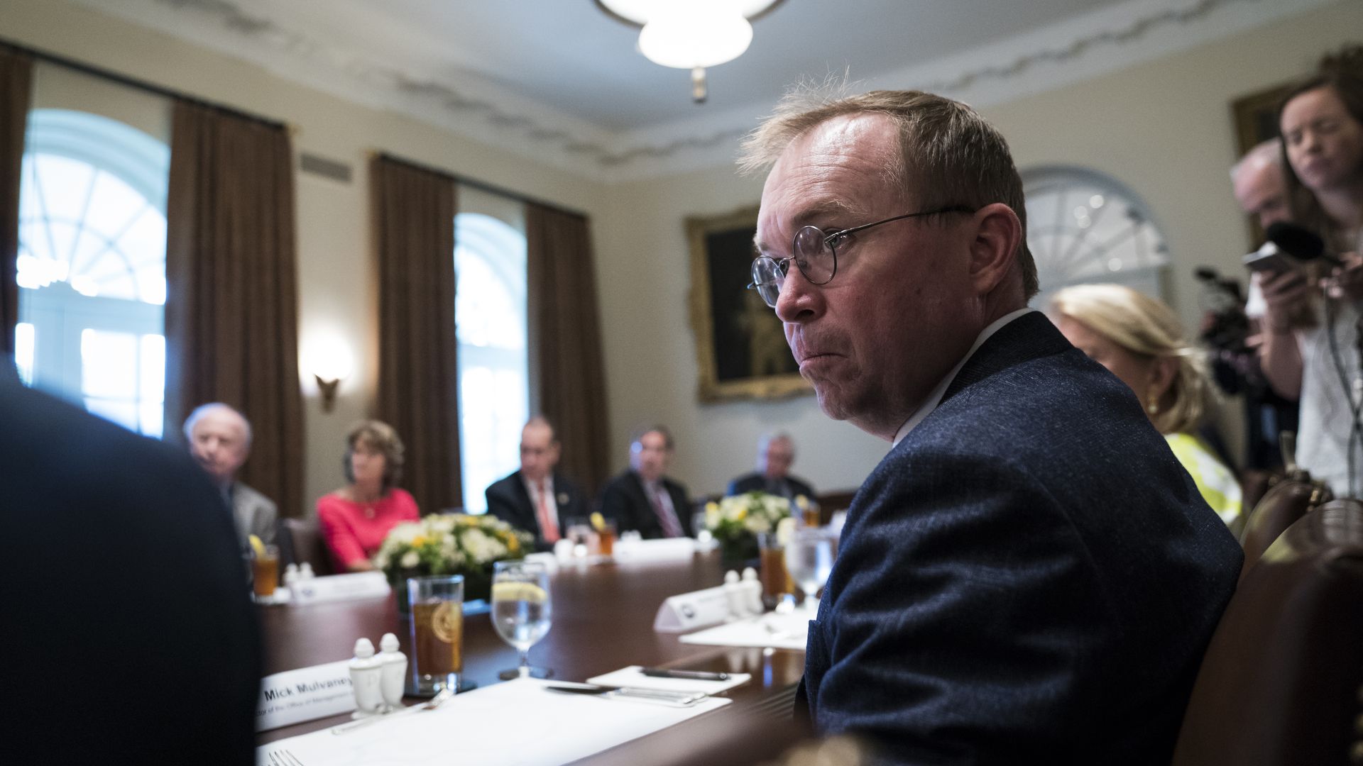 Mick Mulvaney sitting at a cabinet meeting