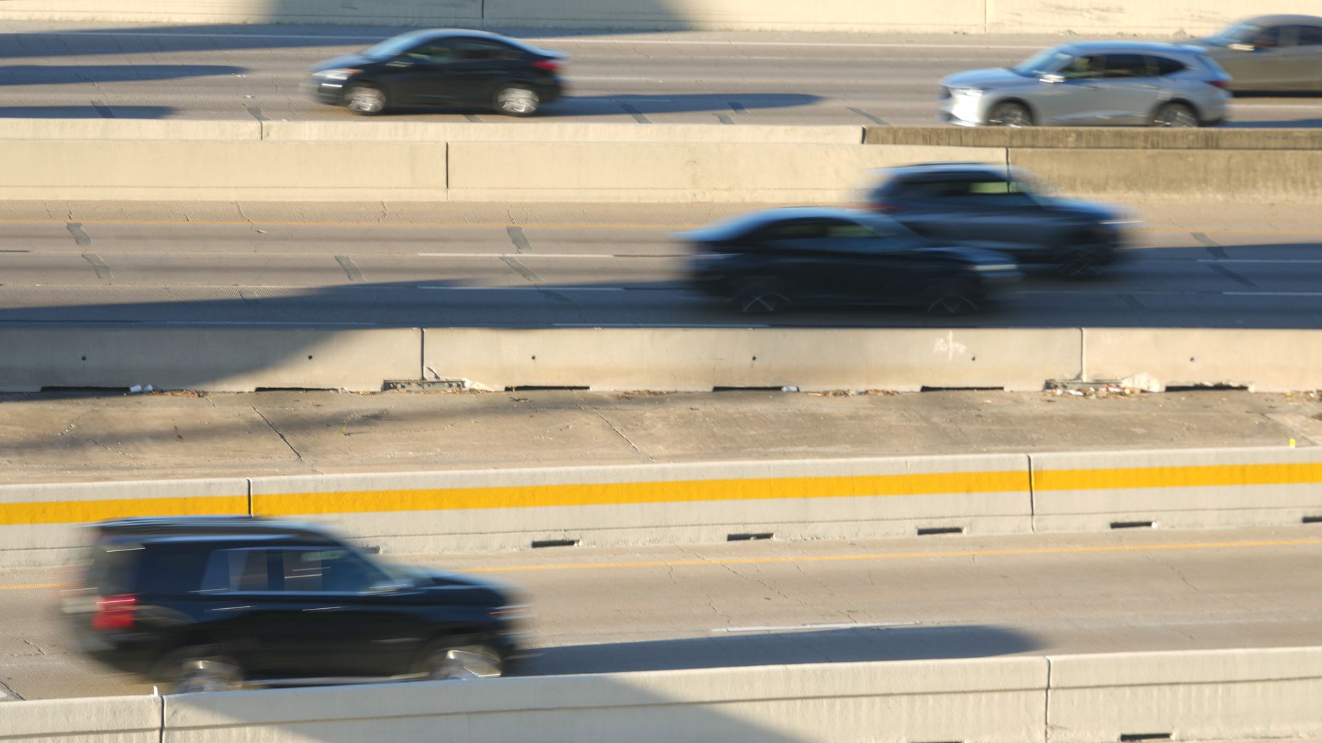Cars drive along Interstate 69 in Houston