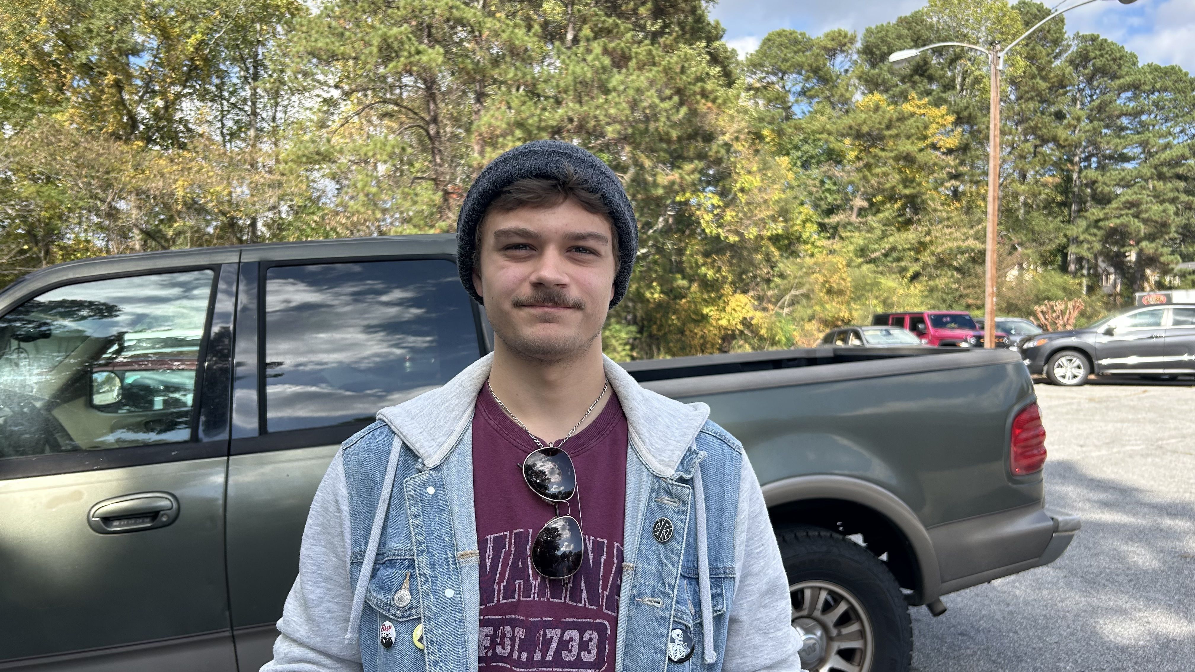man stands in front of truck in georgia