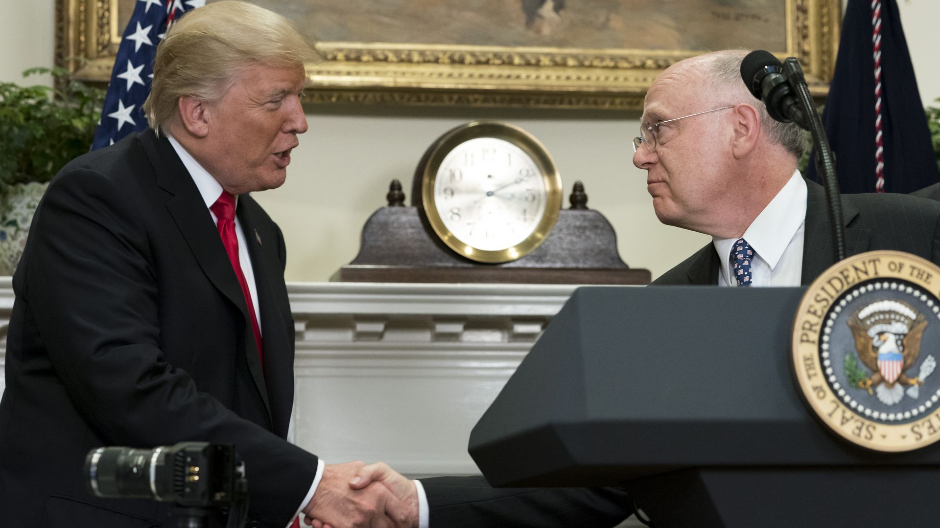 President Trump shaking hands with Ian Read, CEO of Pfizer.