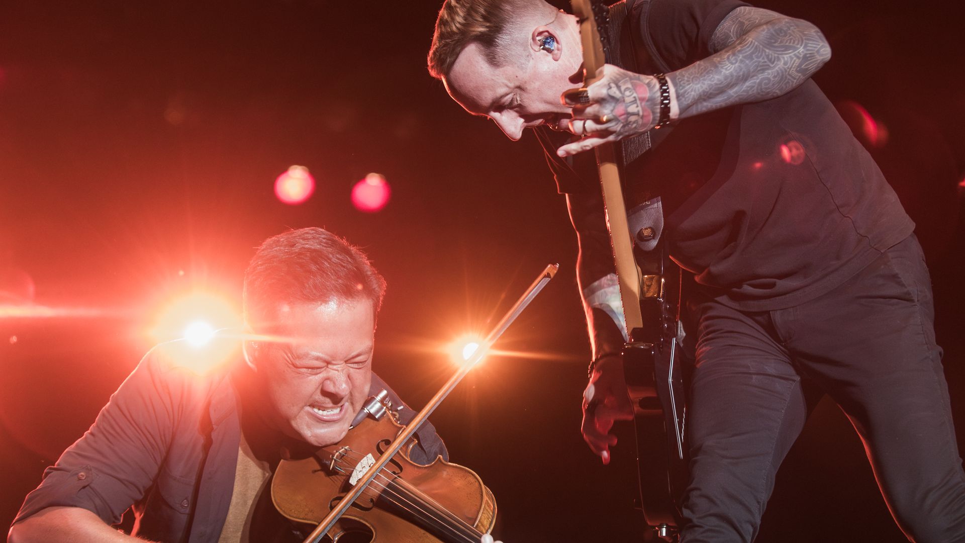 The violinist and guitarist from Yellowcard perform. 