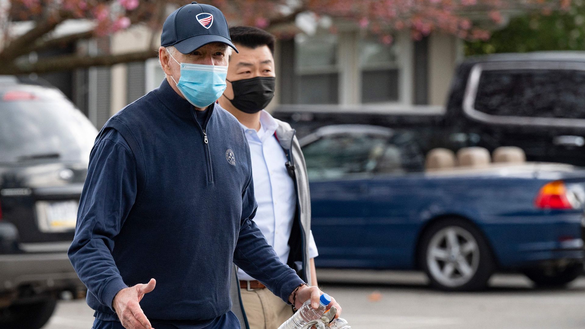 President Joe Biden leaves his cart after a round of golf at Wilmington Country Club in Wilmington, Delaware, on April 17