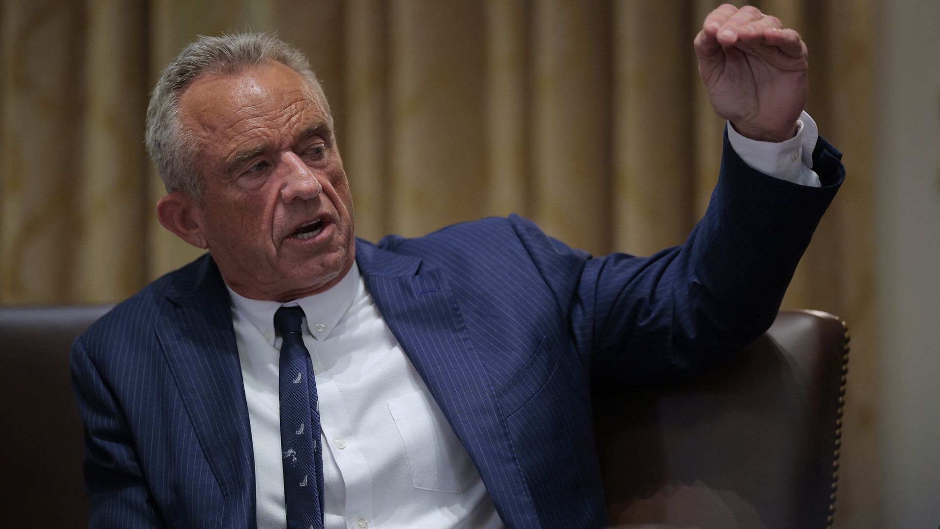 Robert F. Kennedy Jr. speaks during a Cabinet meeting with the current president in the White House Cabinet Room.