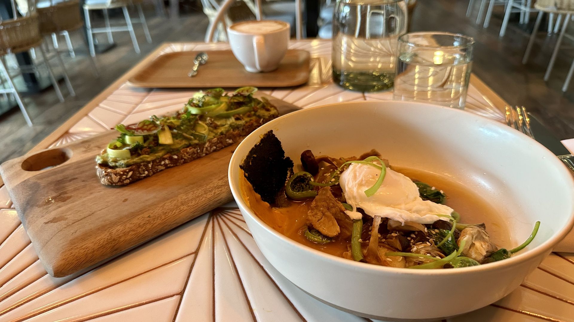 The asparagus and fava toast and mushroom soba bowl at Livbud in Seattle