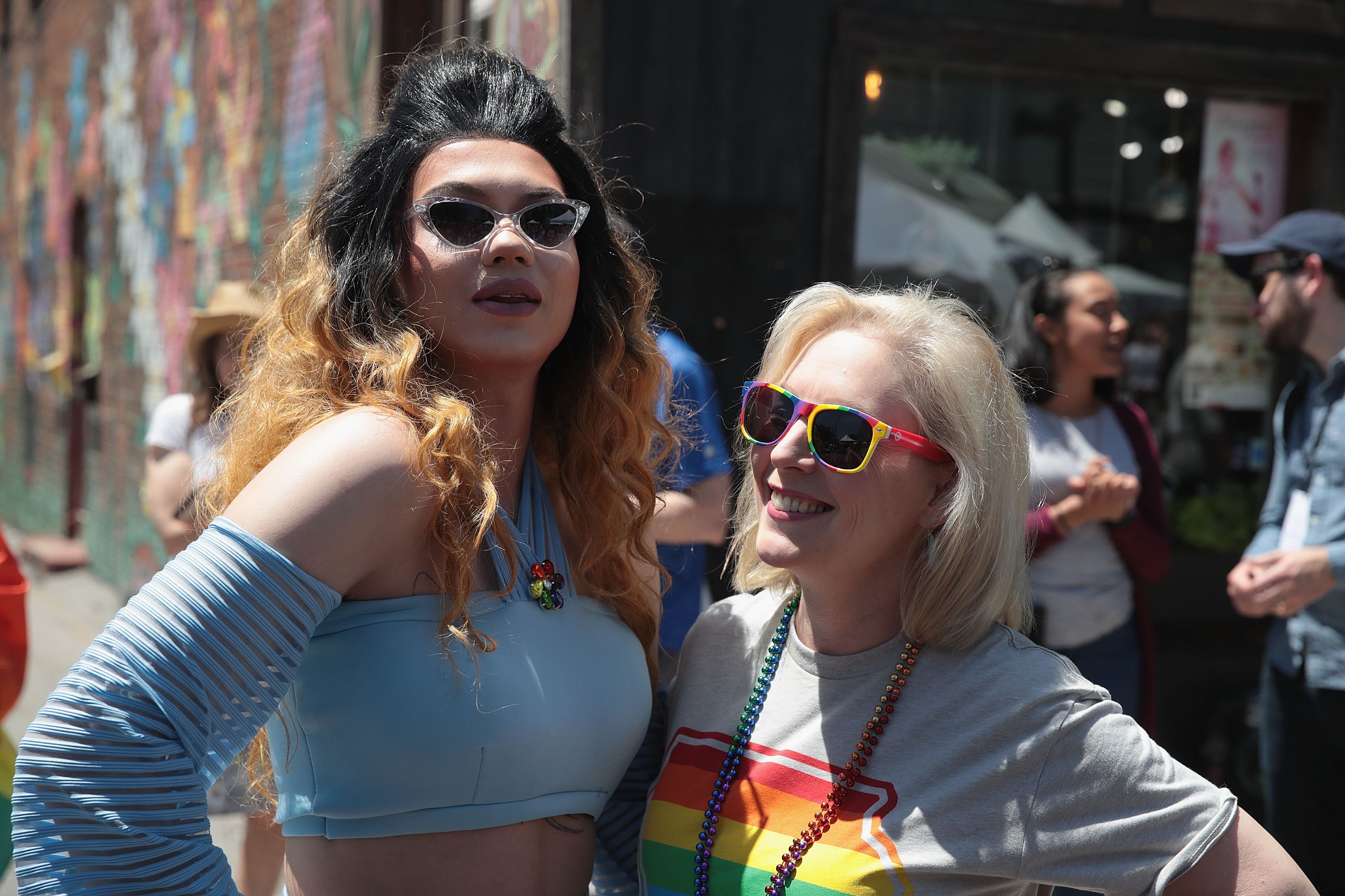 Democratic presidential candidate and New York senator Kirsten Gillibrand (R) tours the Capital City Pride Fest with drag queen Vana Rosenberg on June 08, 2019 in Des Moines, Iowa. 