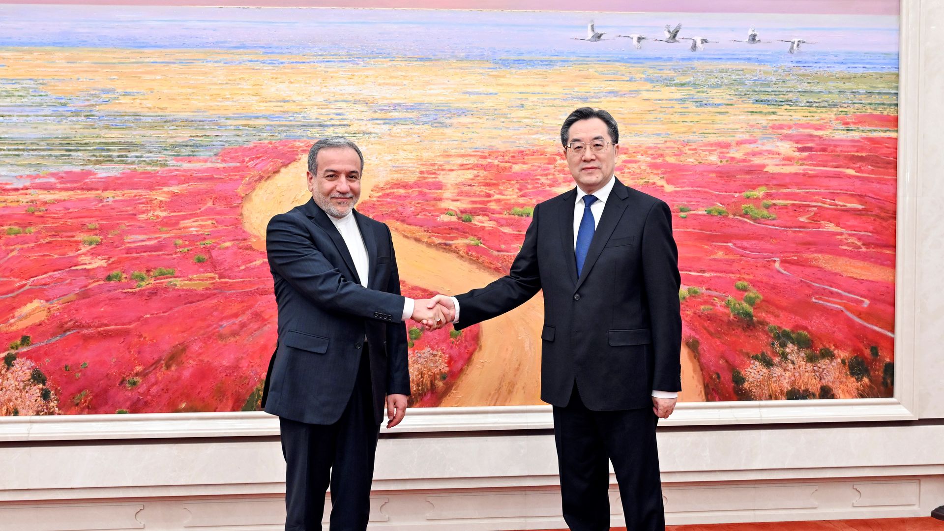 Chinese Vice Premier Ding Xuexiang meets with Iran's Foreign Minister Seyed Abbas Araghchi in Beijing.