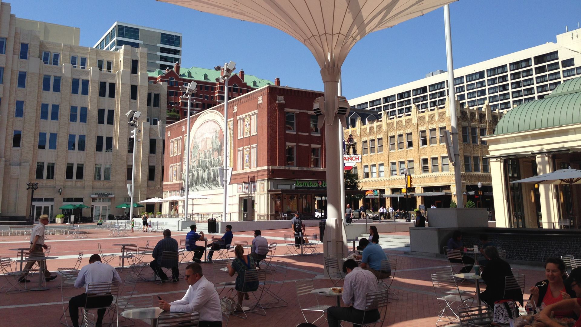 People outside on a sunny day in Fort Worth