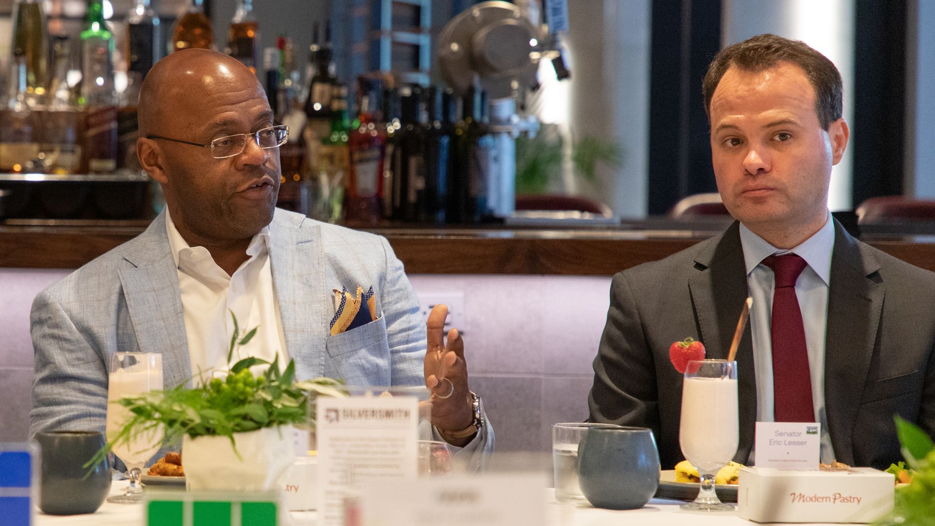 Mo Cowan, the former U.S. senator, sits at a table with other business and political leaders, discussing the Mass. startup ecosystem.
