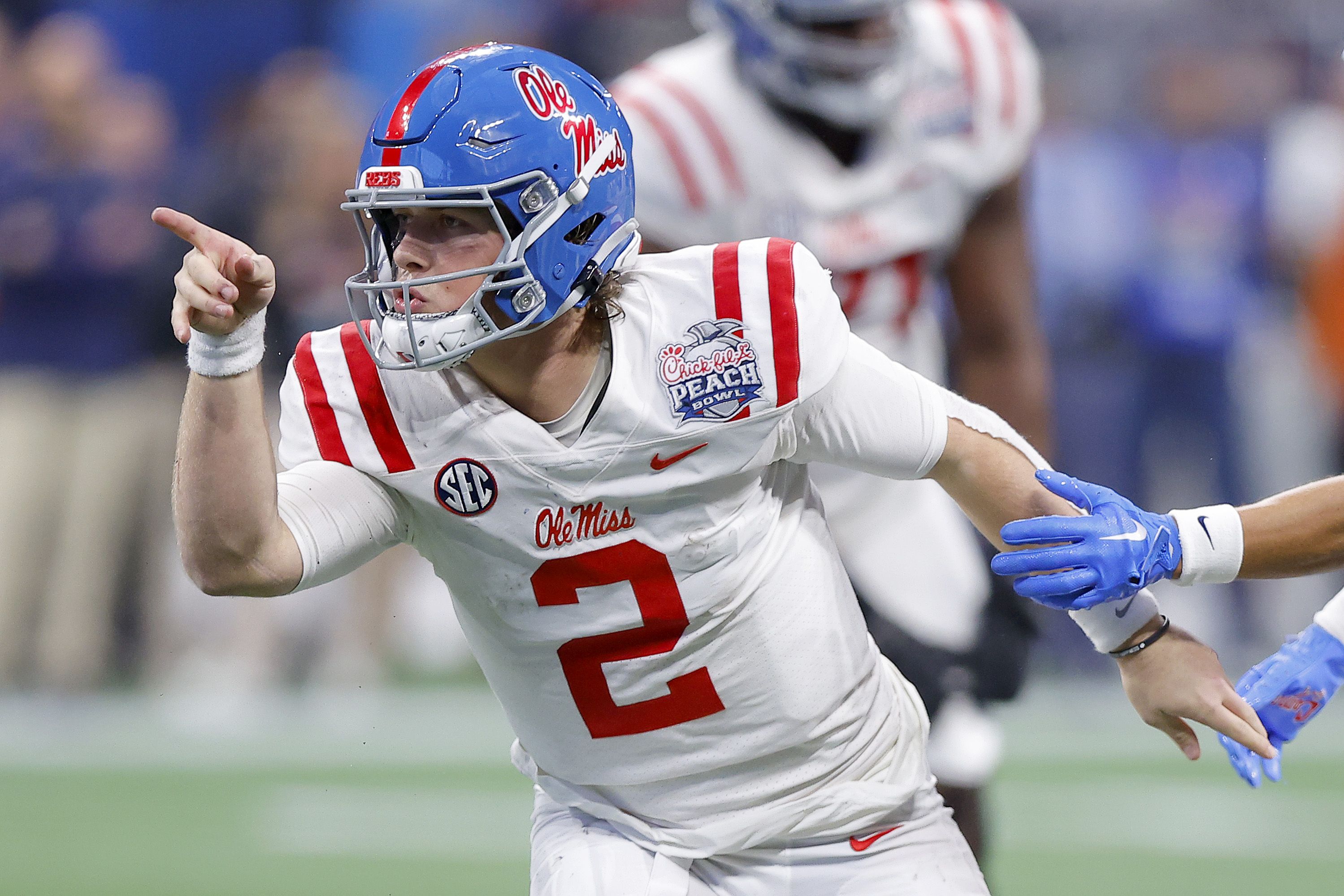 Jaxson Dart #2 of the Mississippi Rebels celebrates a first down against the Penn State Nittany Lions during the fourth quarter in the Chick-fil-A Peach Bowl at Mercedes-Benz Stadium on December 30, 2023 in Atlanta, Georgia. (Photo by Todd Kirkland/Getty Images)