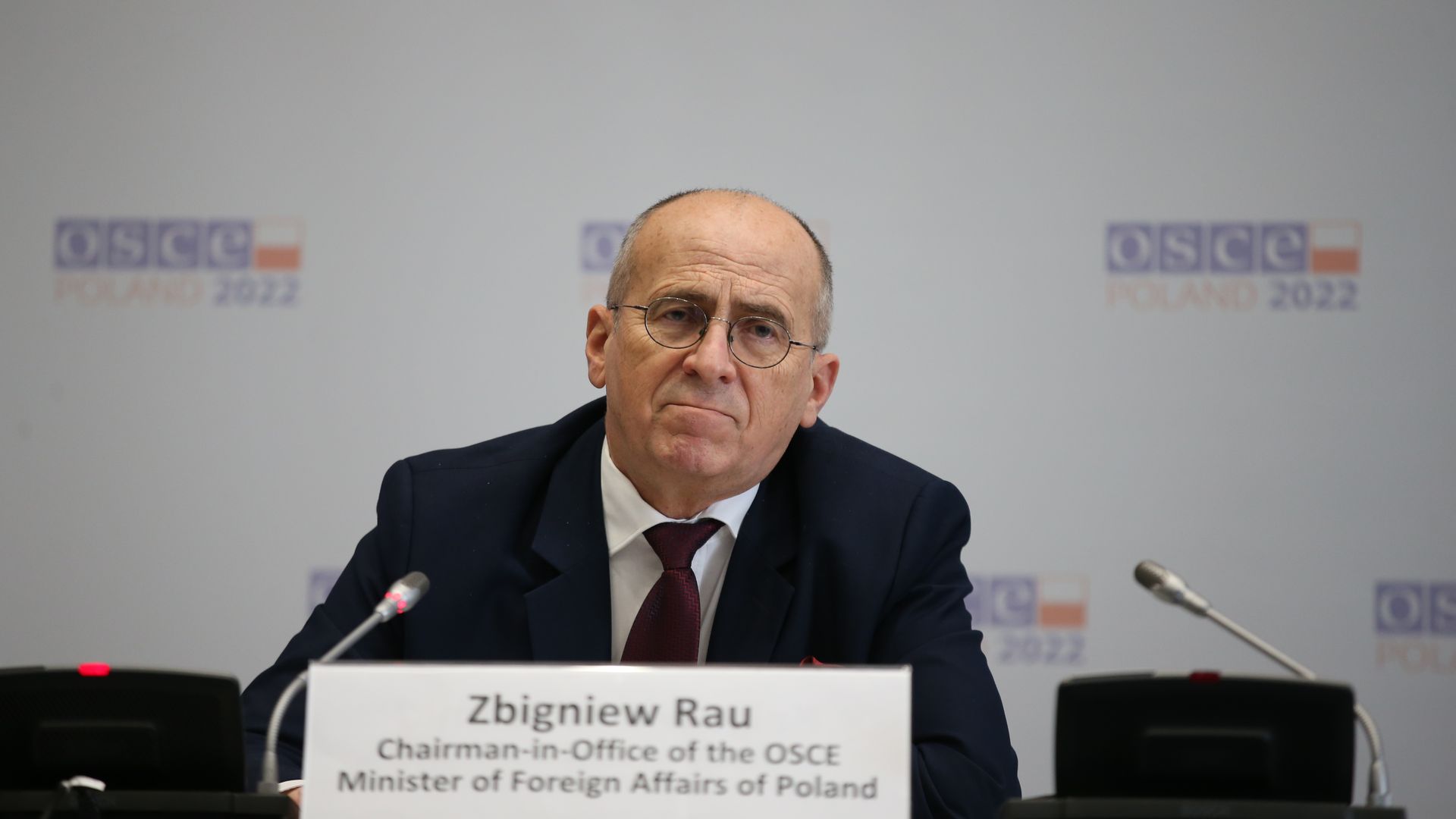 OSCE Chairman-in-Office Zbigniew Rau is seen addressing reporters.