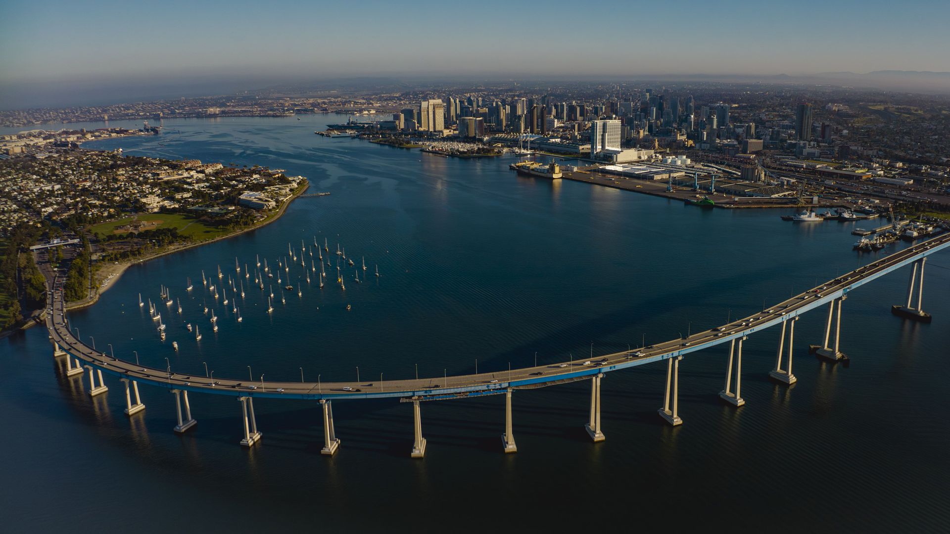 Sunrise view of Coronado Bridge with San Diego Skyline in view from Coronado, California. (Photo by: Joe Sohm/Visions of America/Universal Images Group via Getty Images)