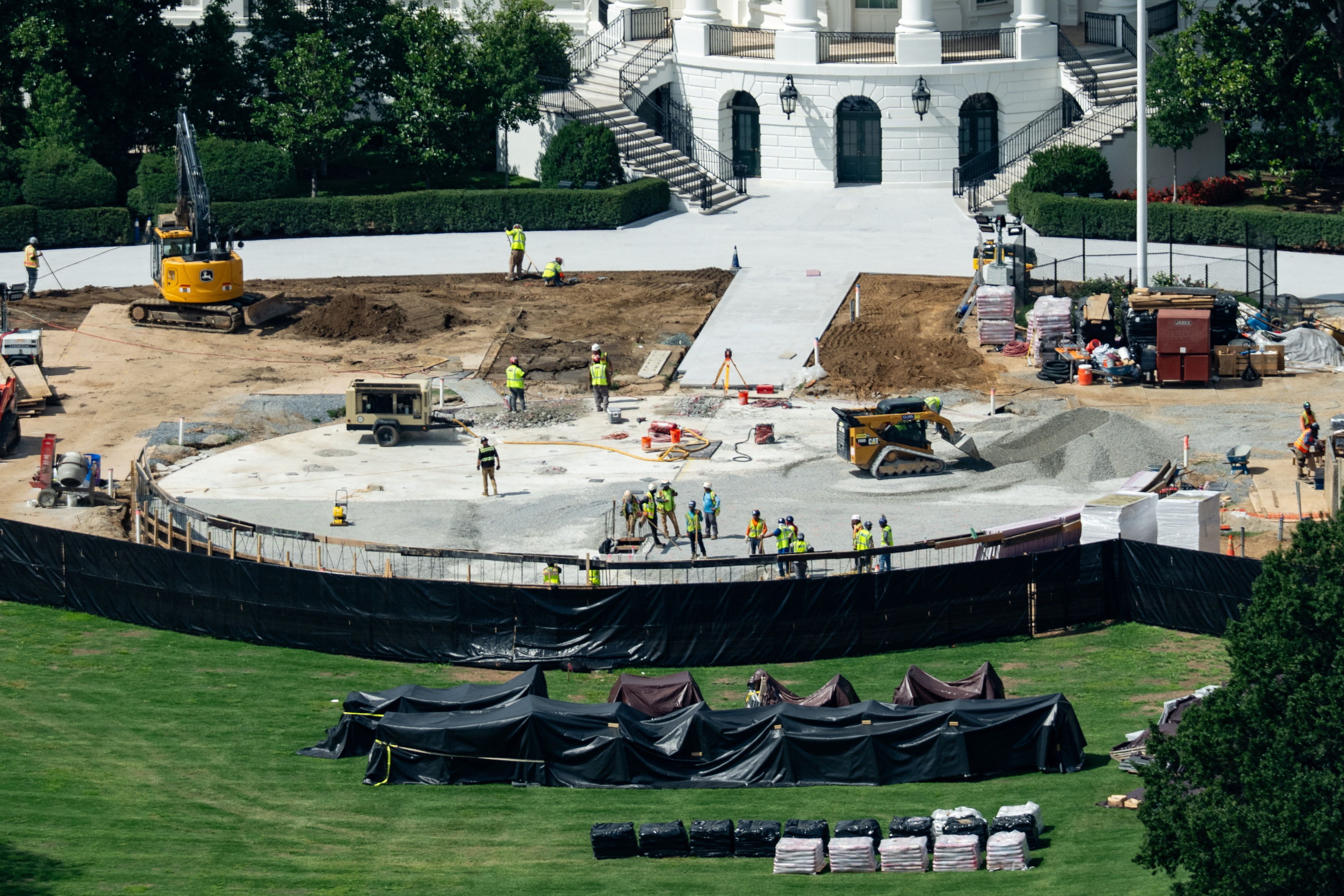 Construction of a helipad at the White House seen from a window at the Washington Monument.
