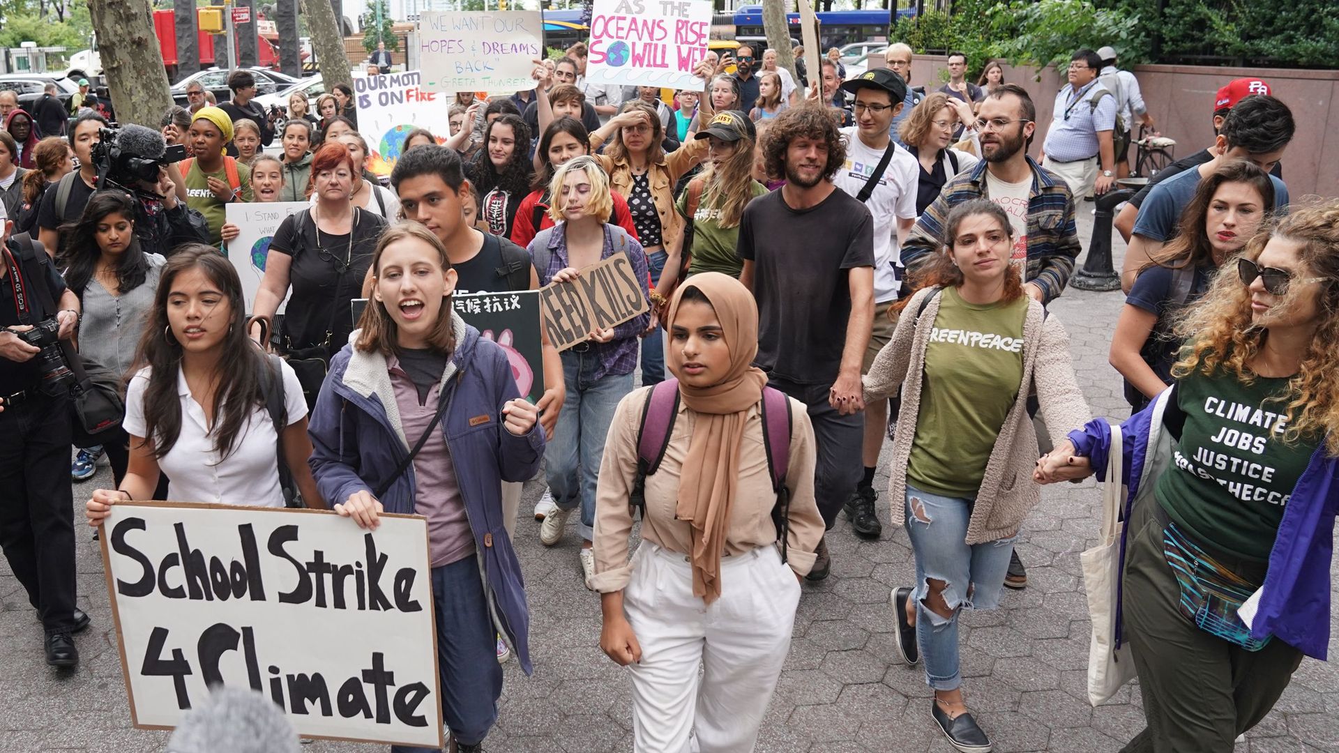 Students march outside the United Nations during a protest against climate change on September 6, 2019 in New York.