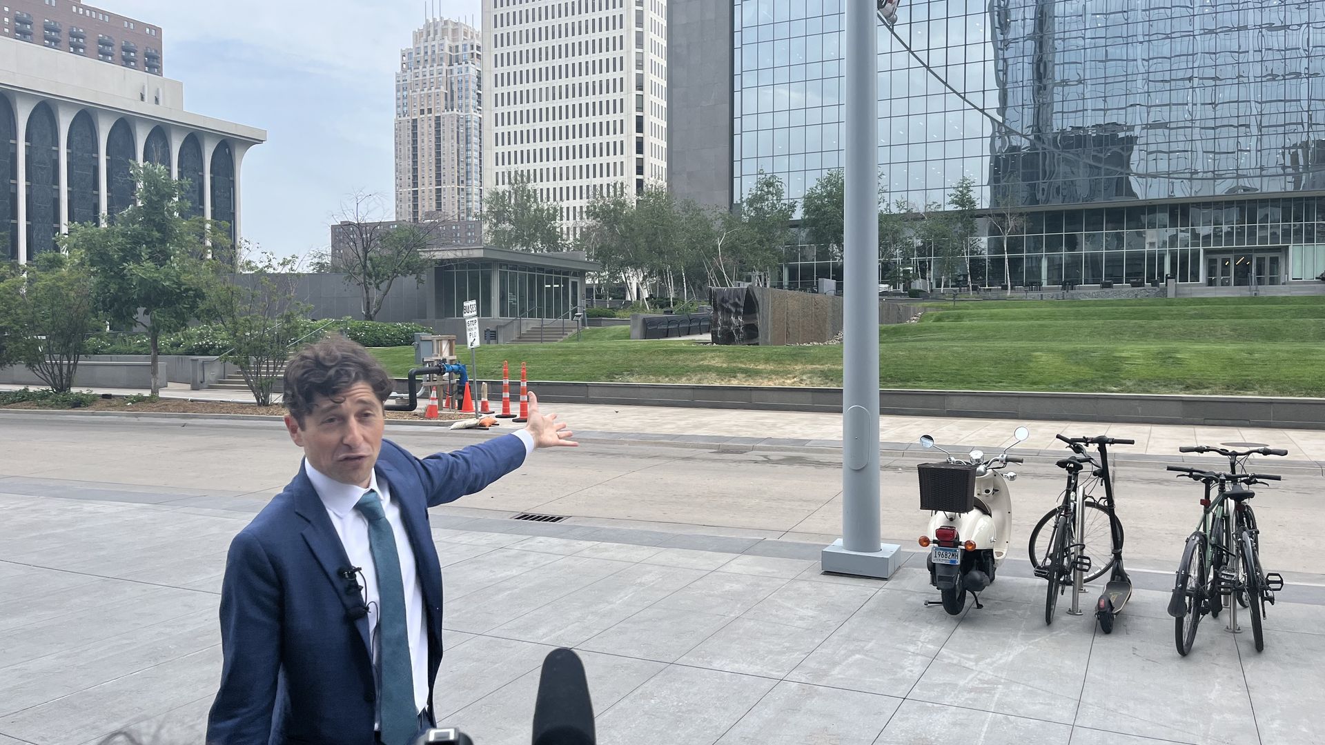 Mayor Jacob Frey points toward Cancer Survivors Park 