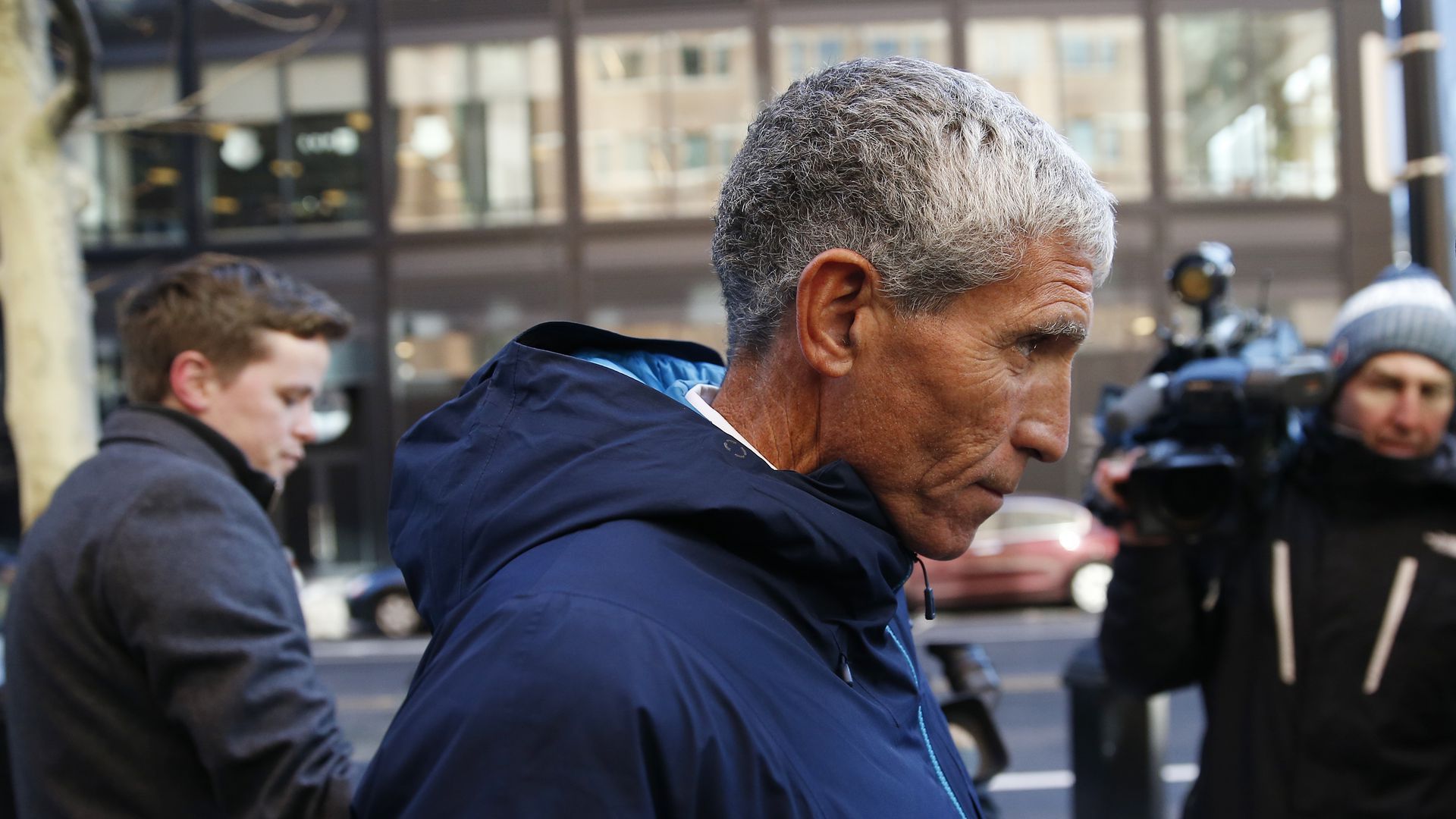 William "Rick" Singer leaves a federal courthouse in Boston on Wednesday