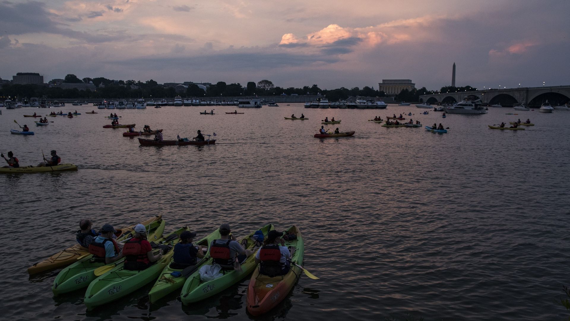 Kayakers and boaters on the Potomac River wait for Fourth of July fireworks in 2017 near the Memorial Bridge