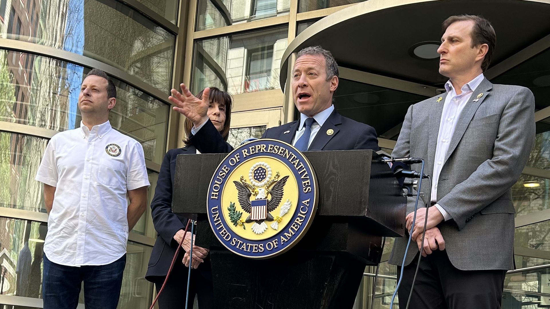 Reps. Jared Moskowitz, Kathy Manning, Josh Gottheimer and Dan Goldman speak in front of the Kraft Center for Jewish Student Life at Columbia University last week.