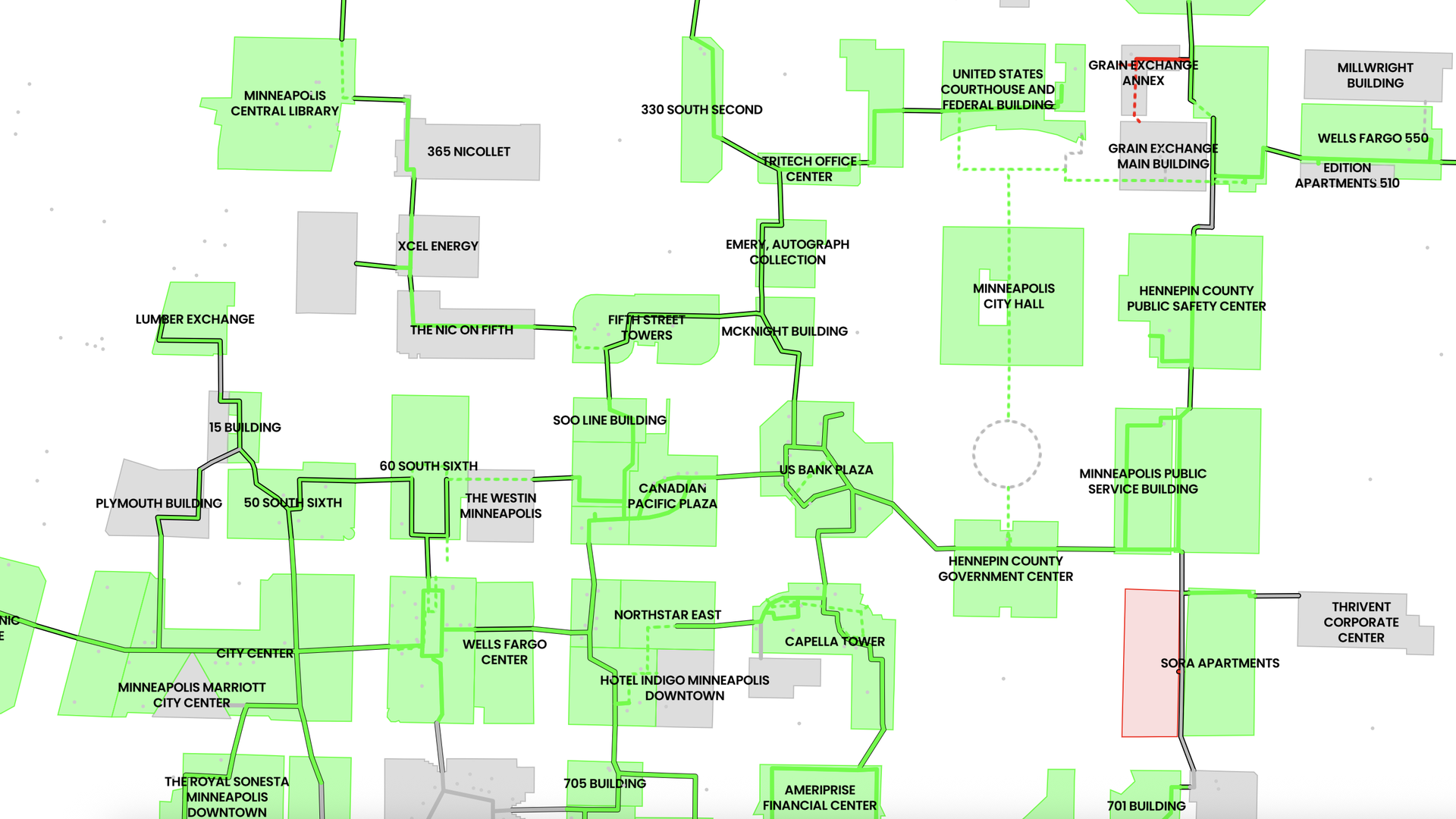 Map of downtown Minneapolis showing buildings and skyway connections. Green highlights skyway-accessible buildings, red highlights limited access. Notable places include Minneapolis Central Library, City Hall, and Hennepin County Government Center.