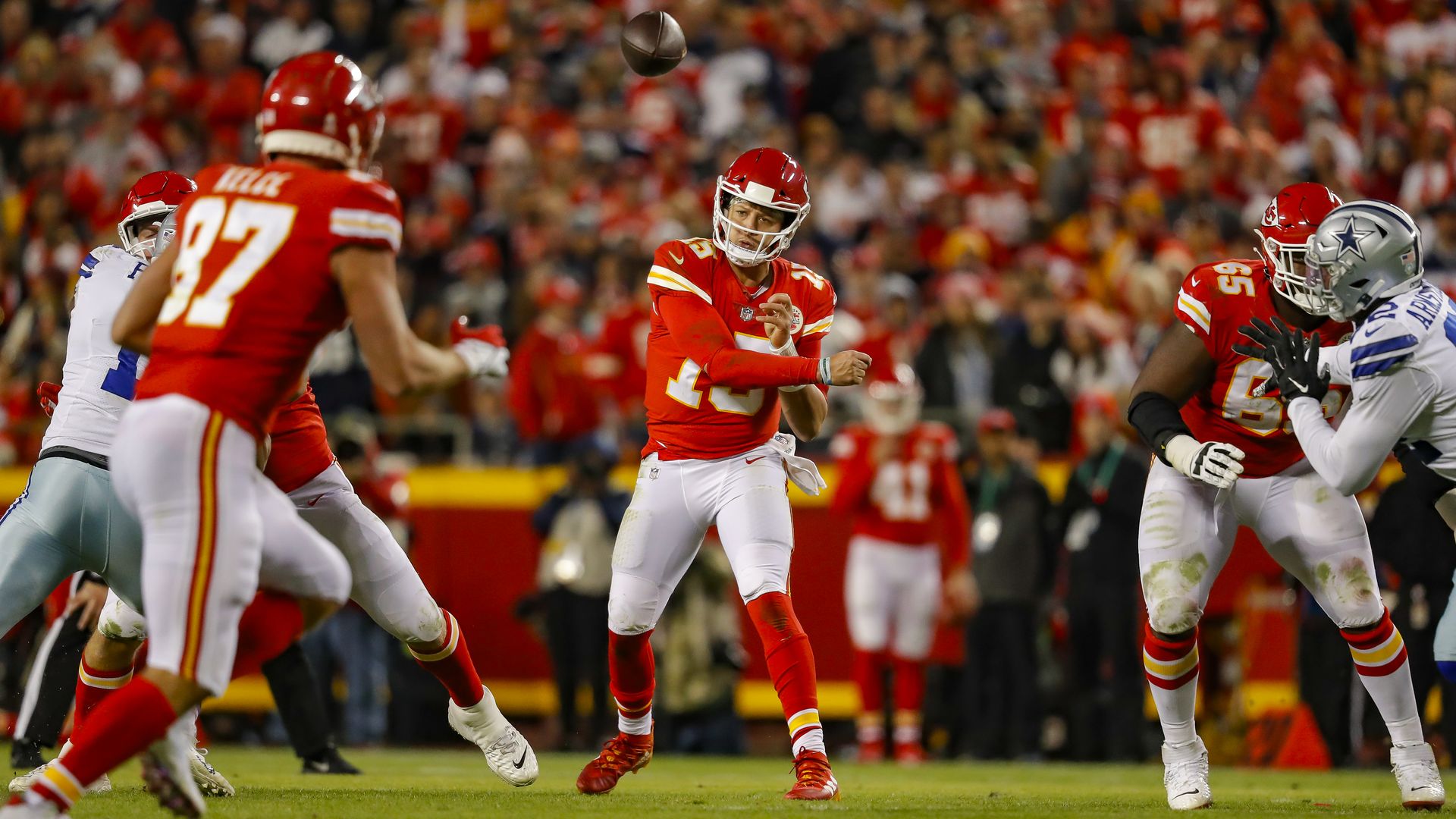 A photo of Patrick Mahomes throwing a ball during a Kansas City Chiefs game against the Dallas Cowboys