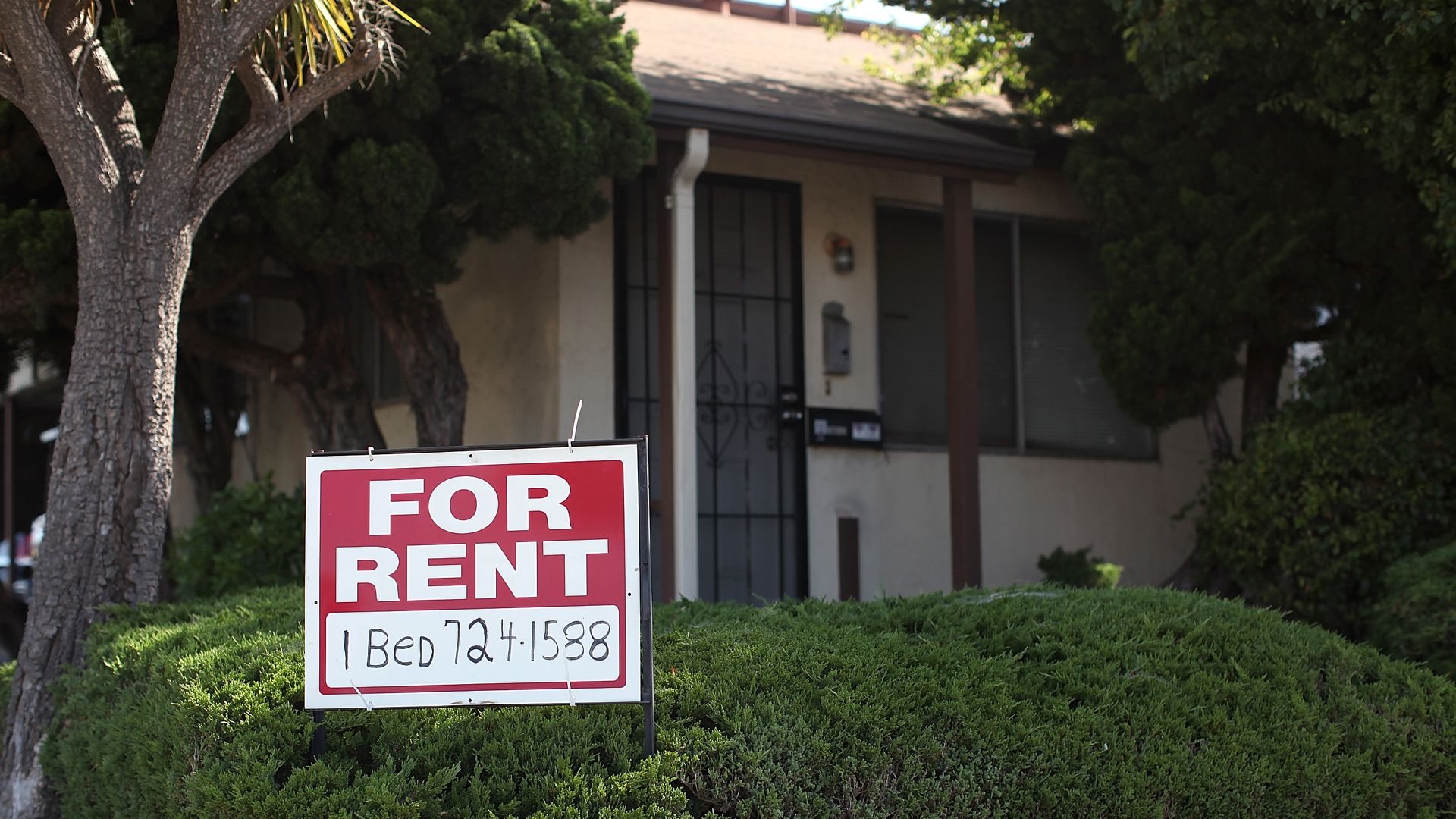 A "for rent" sign is posted in front of a house on June 15, 2012 in Richmond, California.