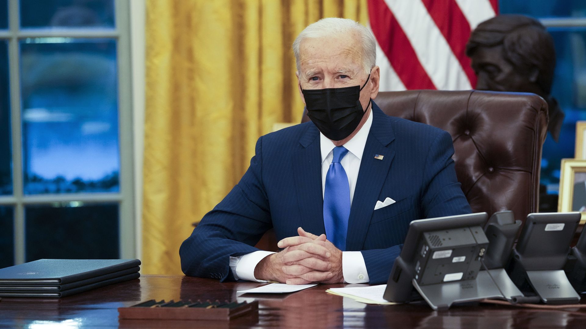 President Joe Biden makes brief remarks before signing several executive orders directing immigration actions for his administration in the Oval Office on February 02, 2021