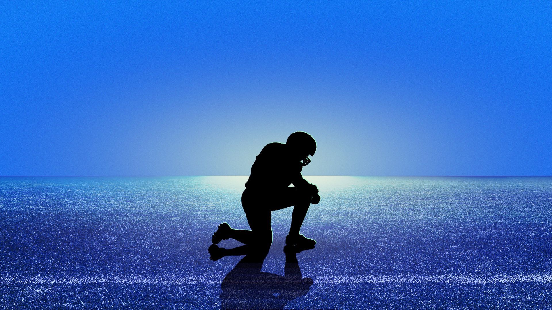 Illustration of a football player in silhouette kneeling on a field 