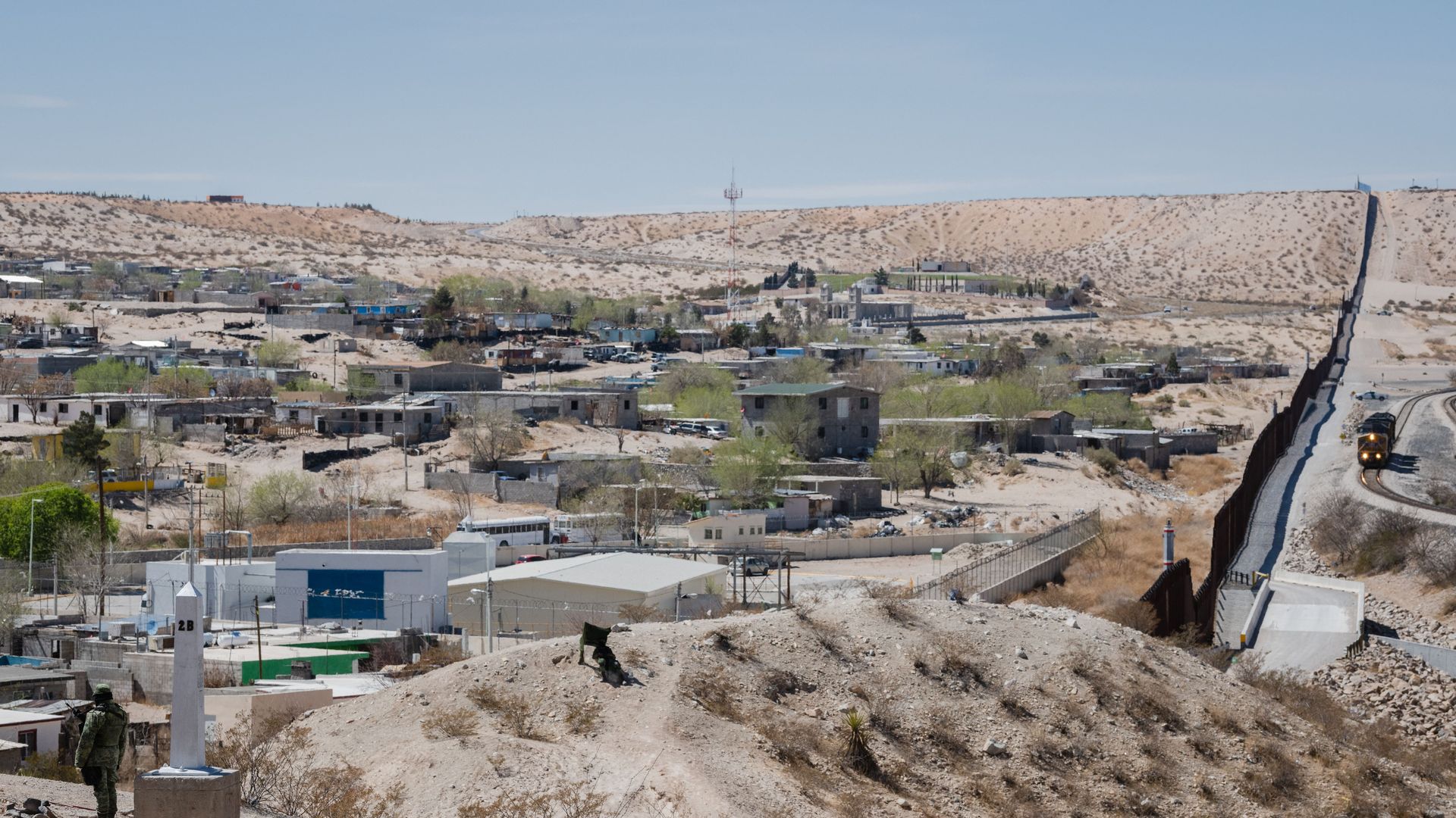 A member of the Mexican Guard stands guard at the border between the United States and Mexico following the House GOP Congressional Delegation to the border Sunland Park, New Mexico 