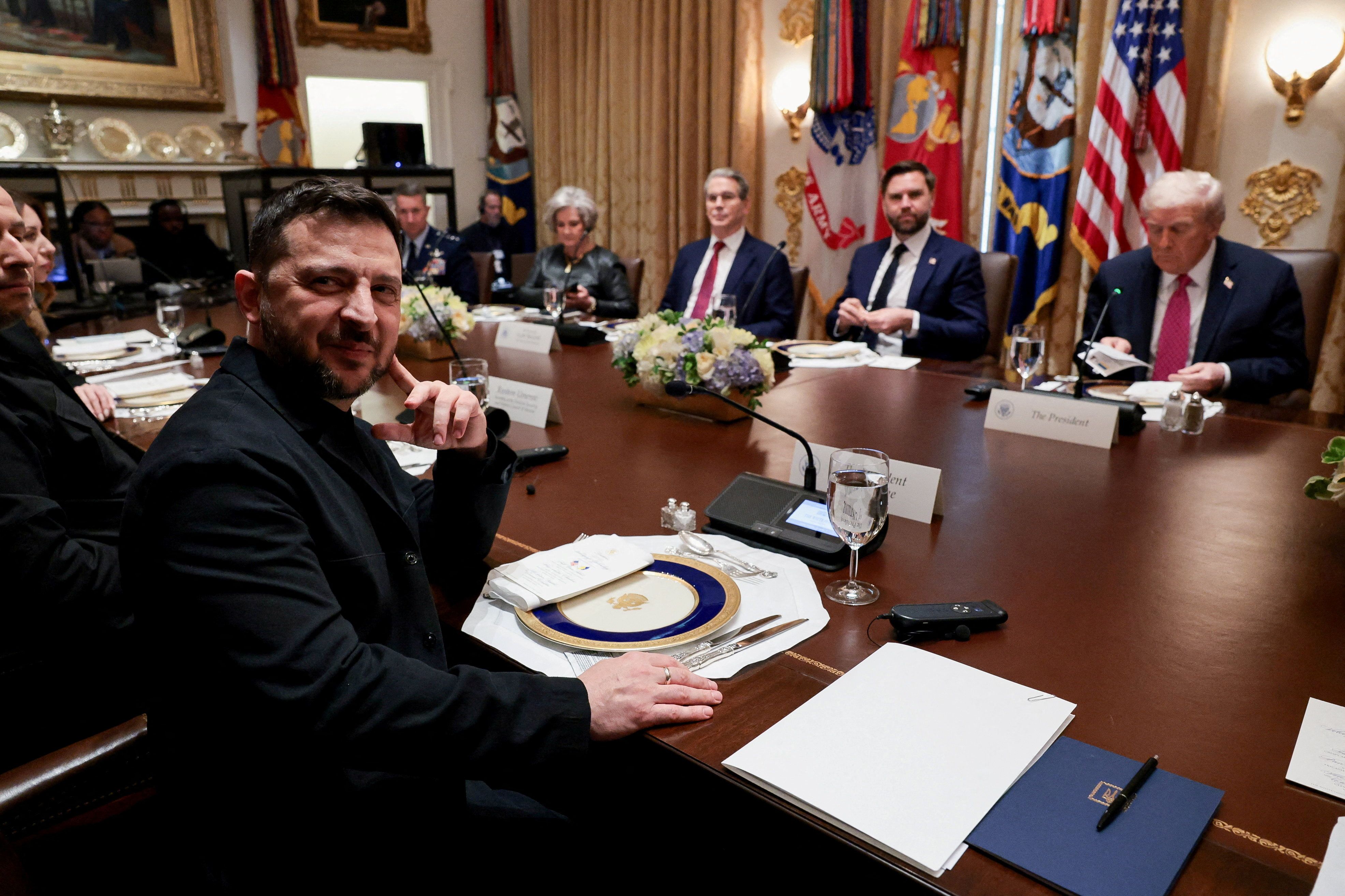 Volodymyr Zelensky lunches with President Trump in the Cabinet Room today. Photo: Jonathan Ernst/Reuters





