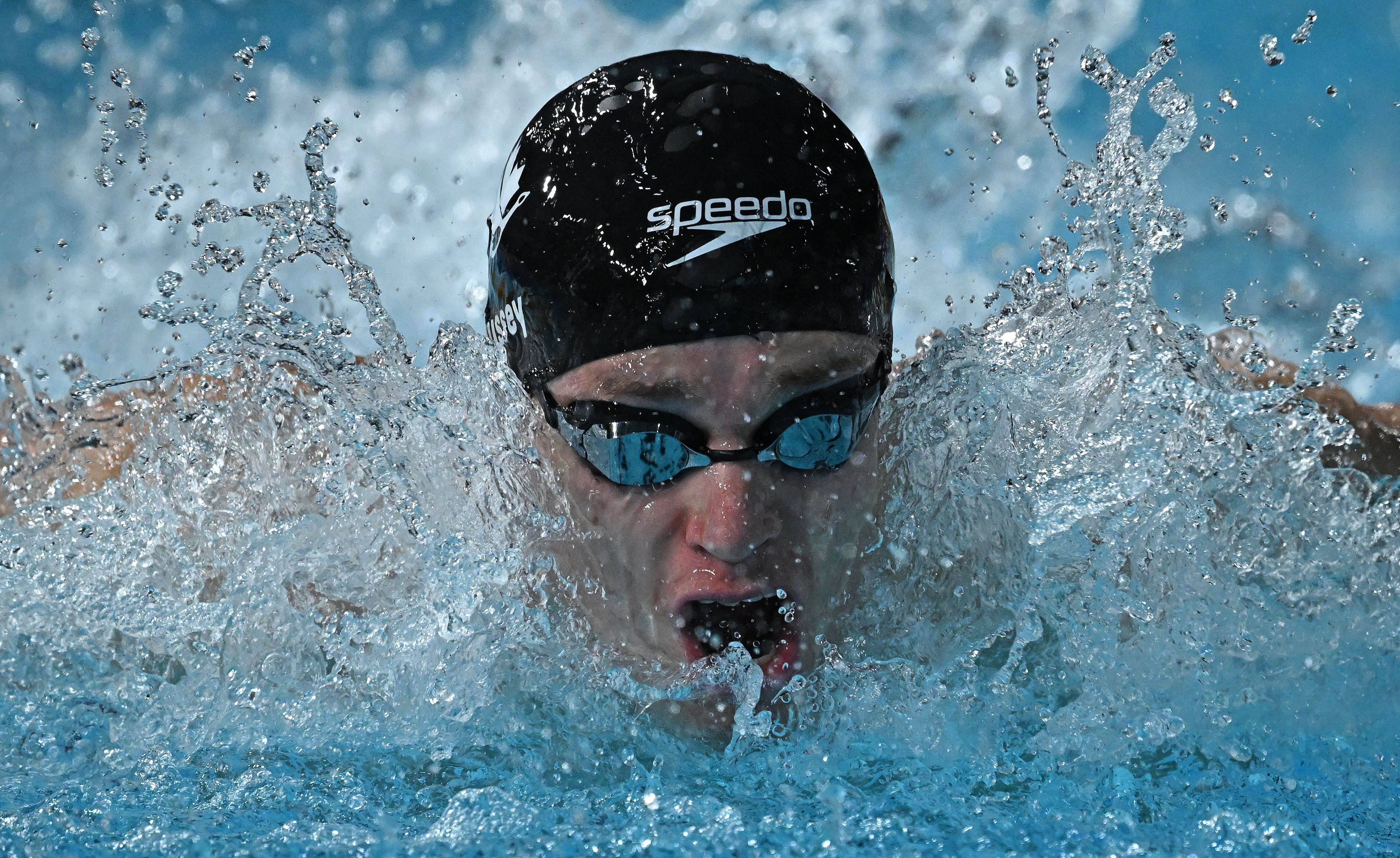 Canada's Patrick Hussey competes in the mixed 4x100m medley relay heats swimming event at the Sandwell Aquatics Centre, on day five of the Commonwealth Games in Birmingham, central England, on August 2, 2022. (Photo by Oli SCARFF / AFP) (Photo by OLI SCARFF/AFP via Getty Images)