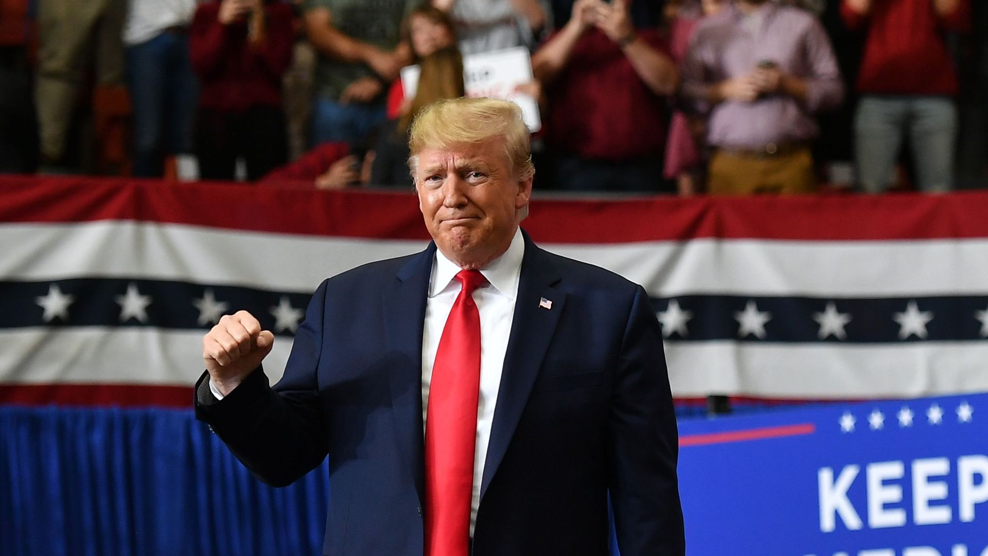 President Donald Trump gestures as he arrives for a rally at the Monroe Civic Center in Monroe, Louisiana on November 6