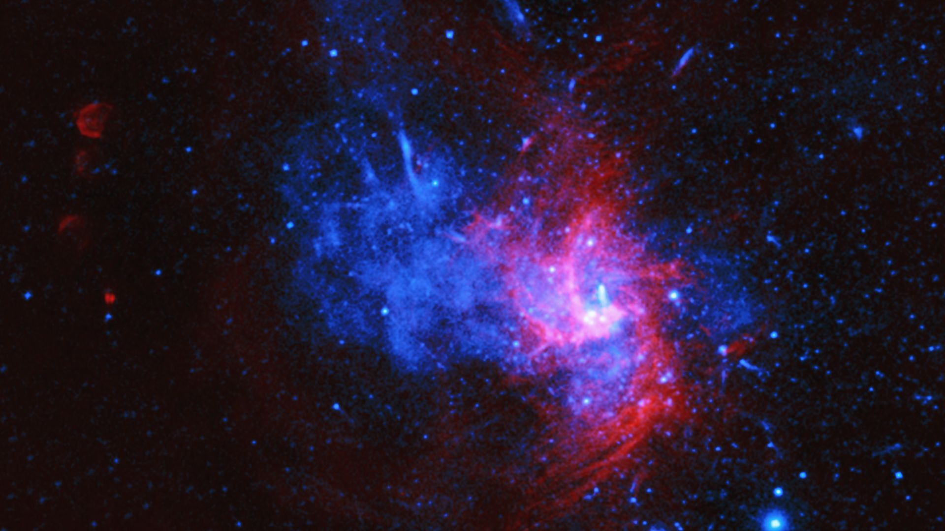 A rare type of star explosion seen in blue and pink