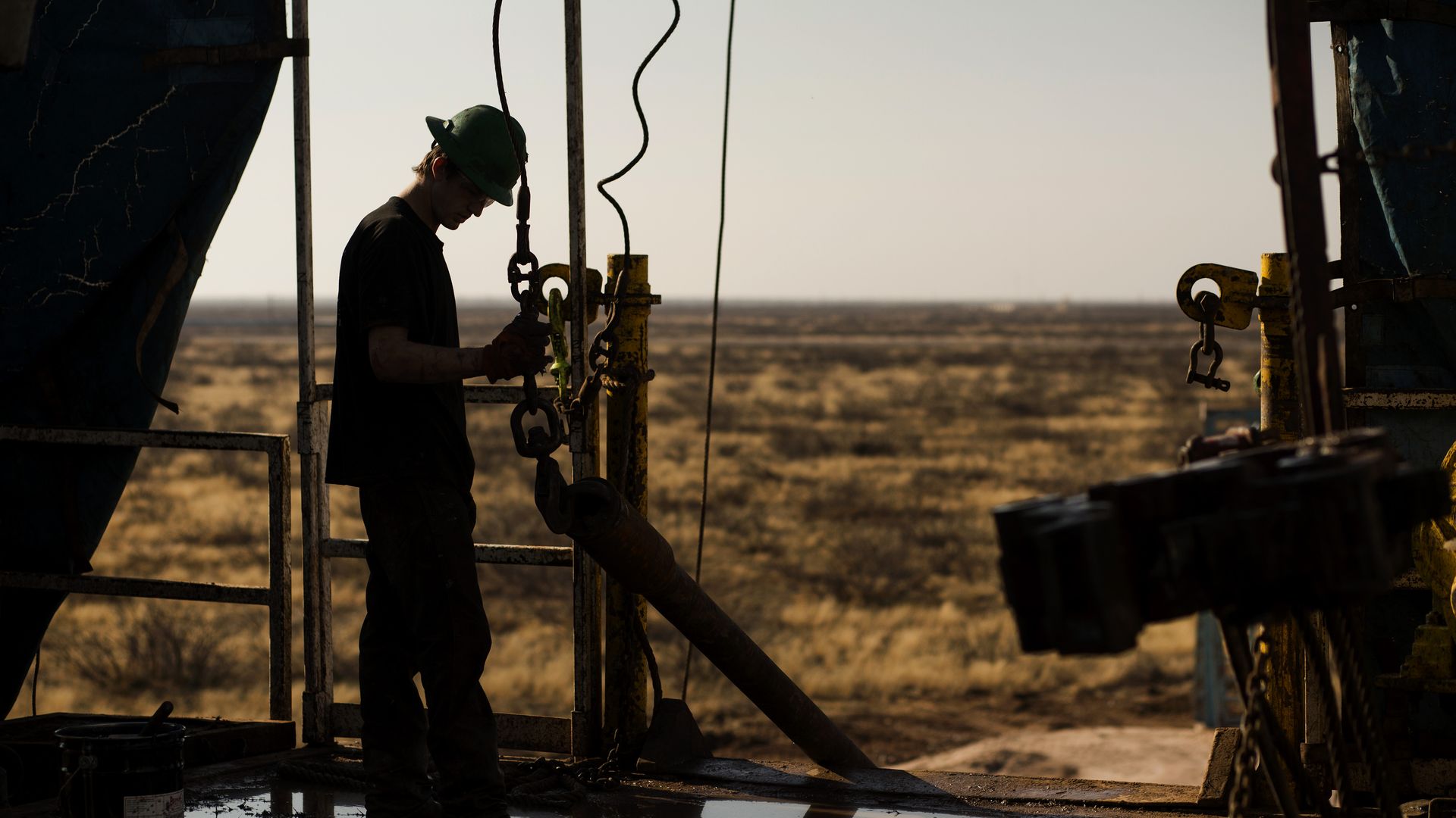 Worker at drilling rig