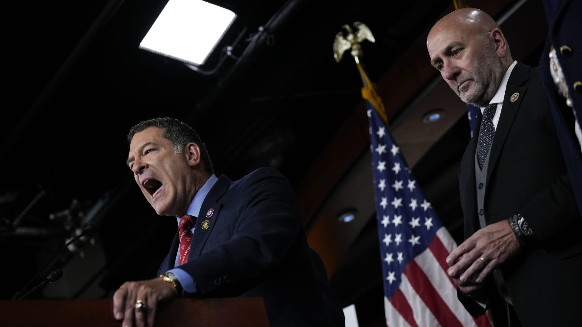 Chairman of the House Homeland Security Committee Rep. Mark Green (R-TN) speaks as Rep. Clay Higgins (R-LA) looks on during a news conference 
