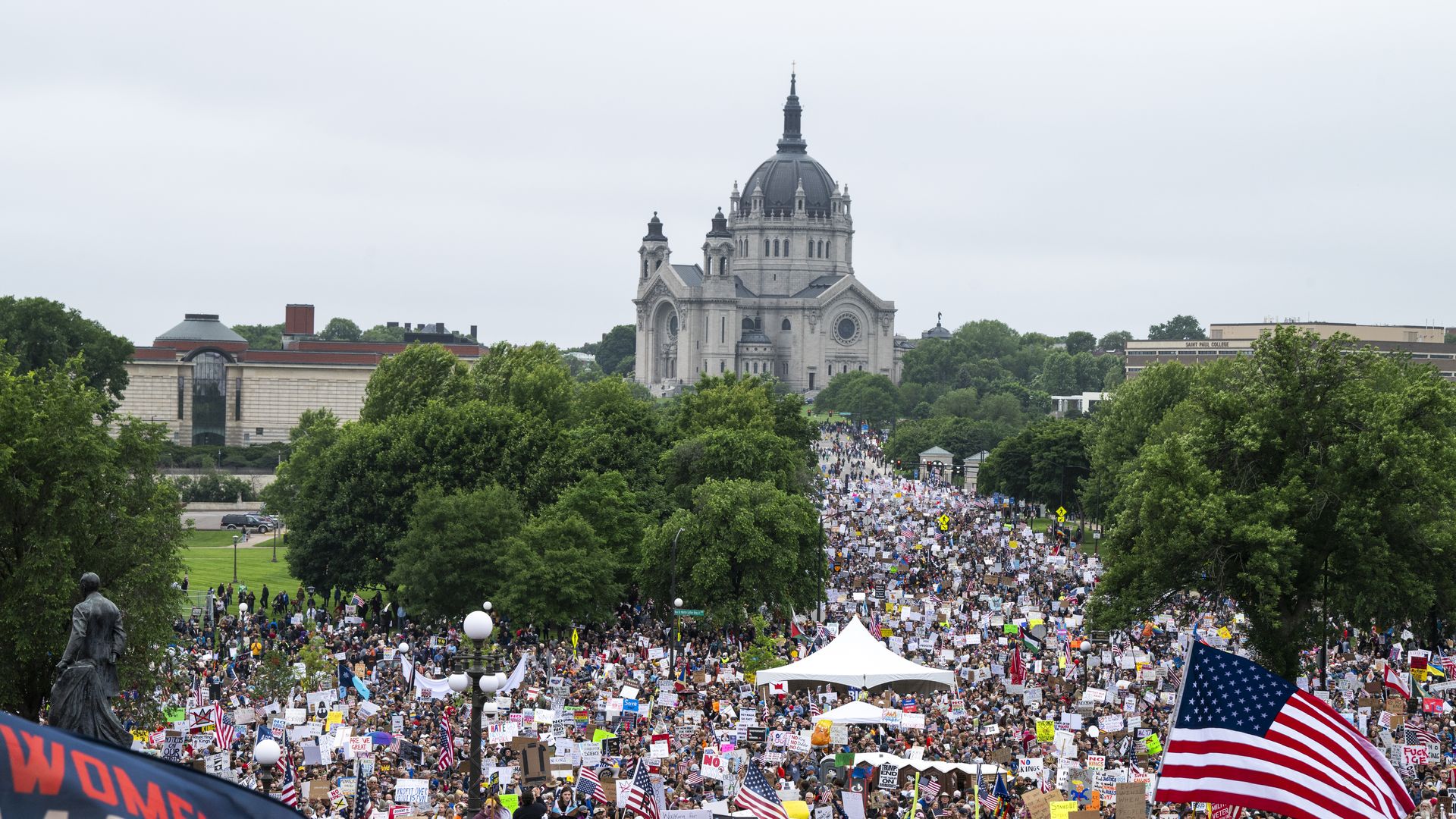 A sea of demonstrators fill the streets as they march to the Minnesota State Capitol building during a "No Kings" protest on June 14, 2025 in St Paul, Minnesota. 