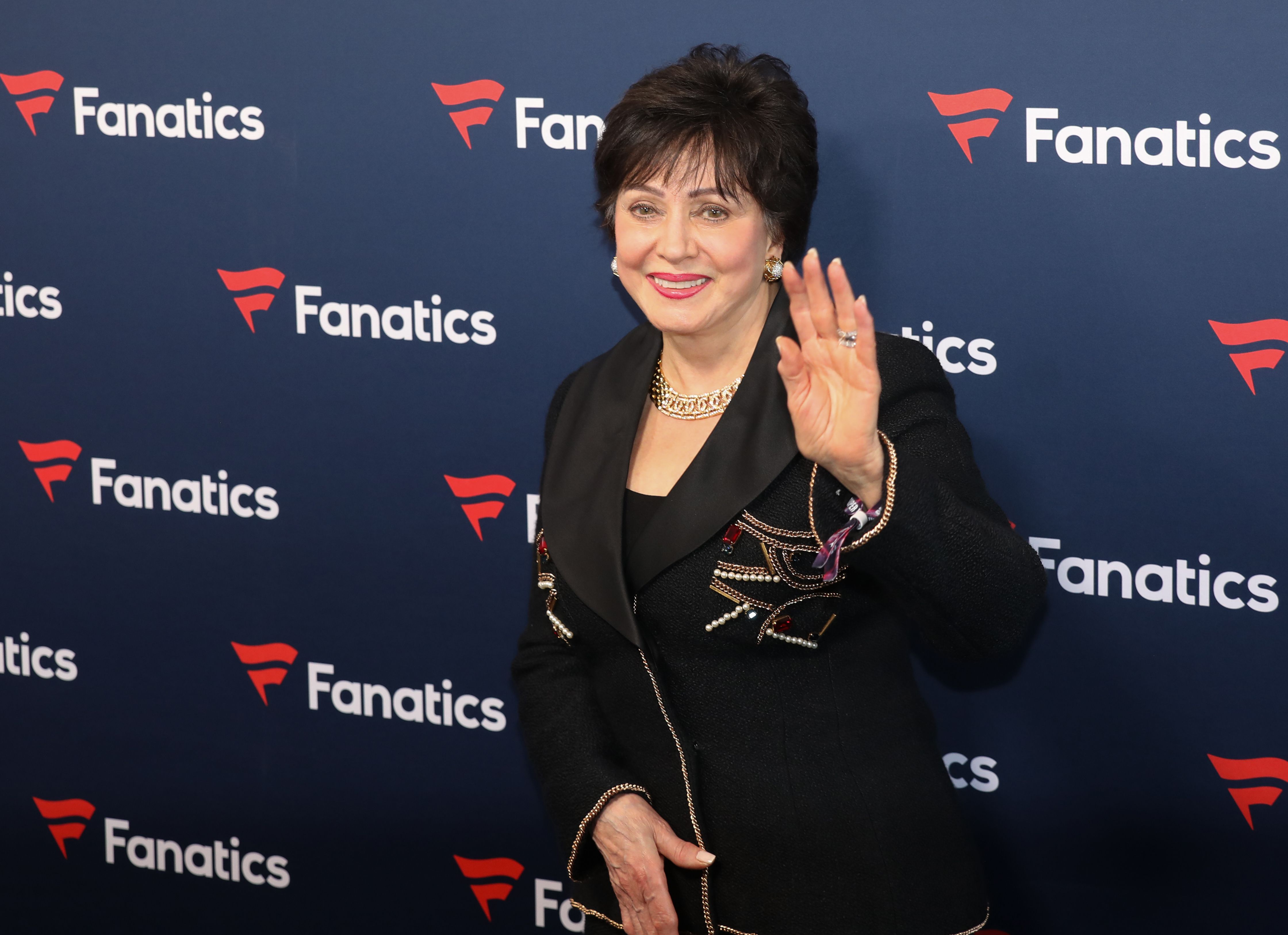 Photo shows Gayle Benson waving.
