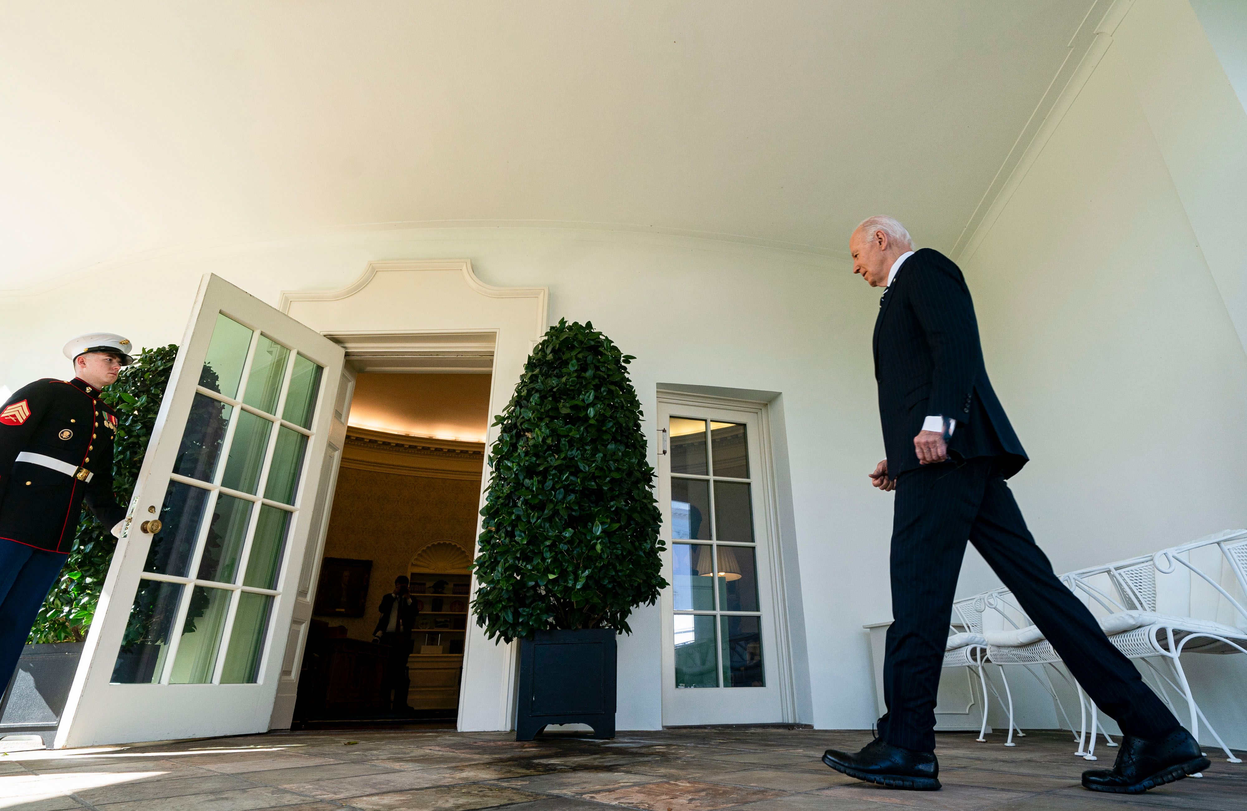 President Biden enters the Oval Office yesterday after speaking about the election.