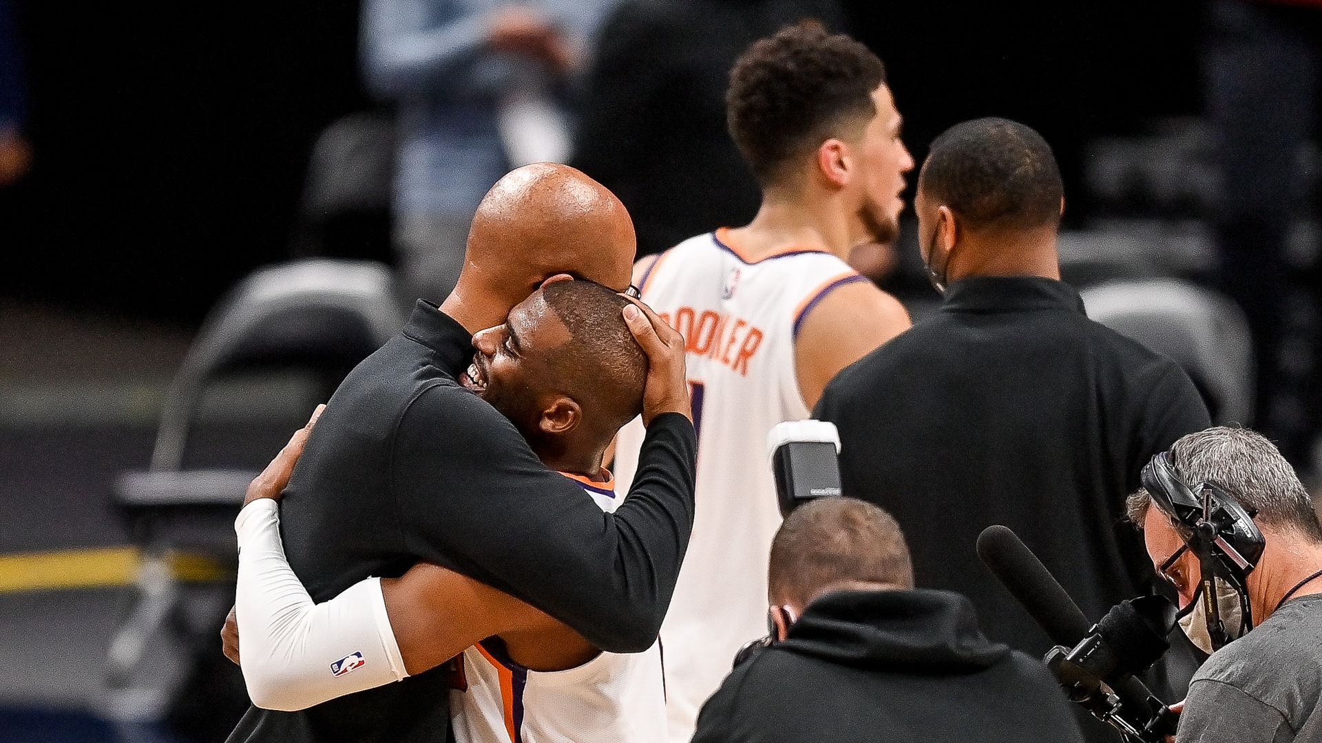 Chris Paul hugging his coach
