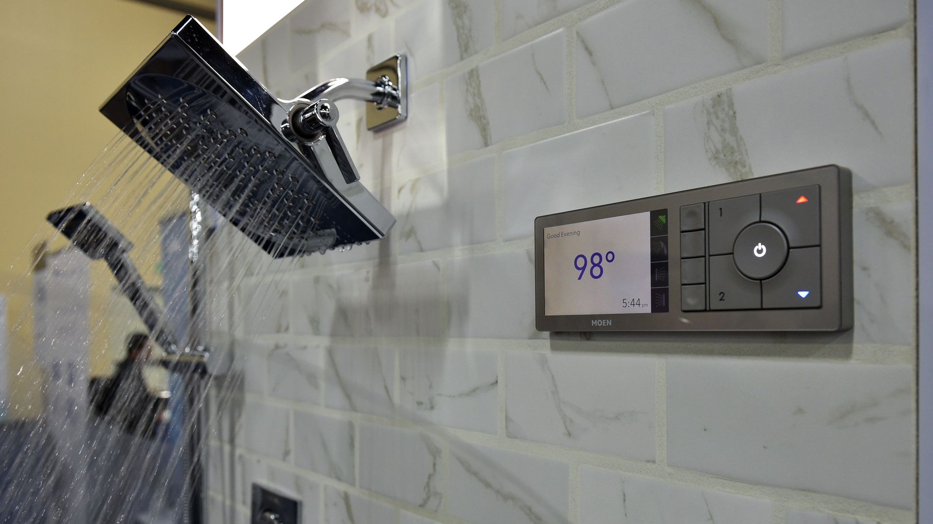 A voice enabled shower streams water